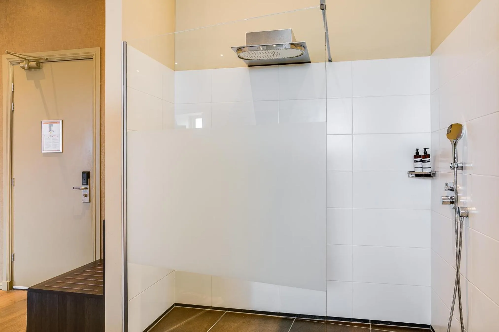 Bathroom in Brasss Hotel Suites