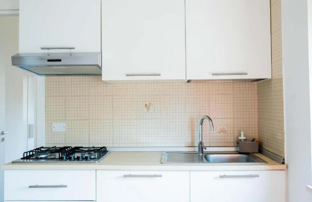 Kitchen or kitchenette in Residence La Giungla