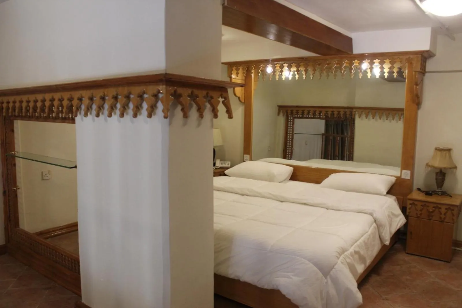 Bed in Kuwait Palace Hotel