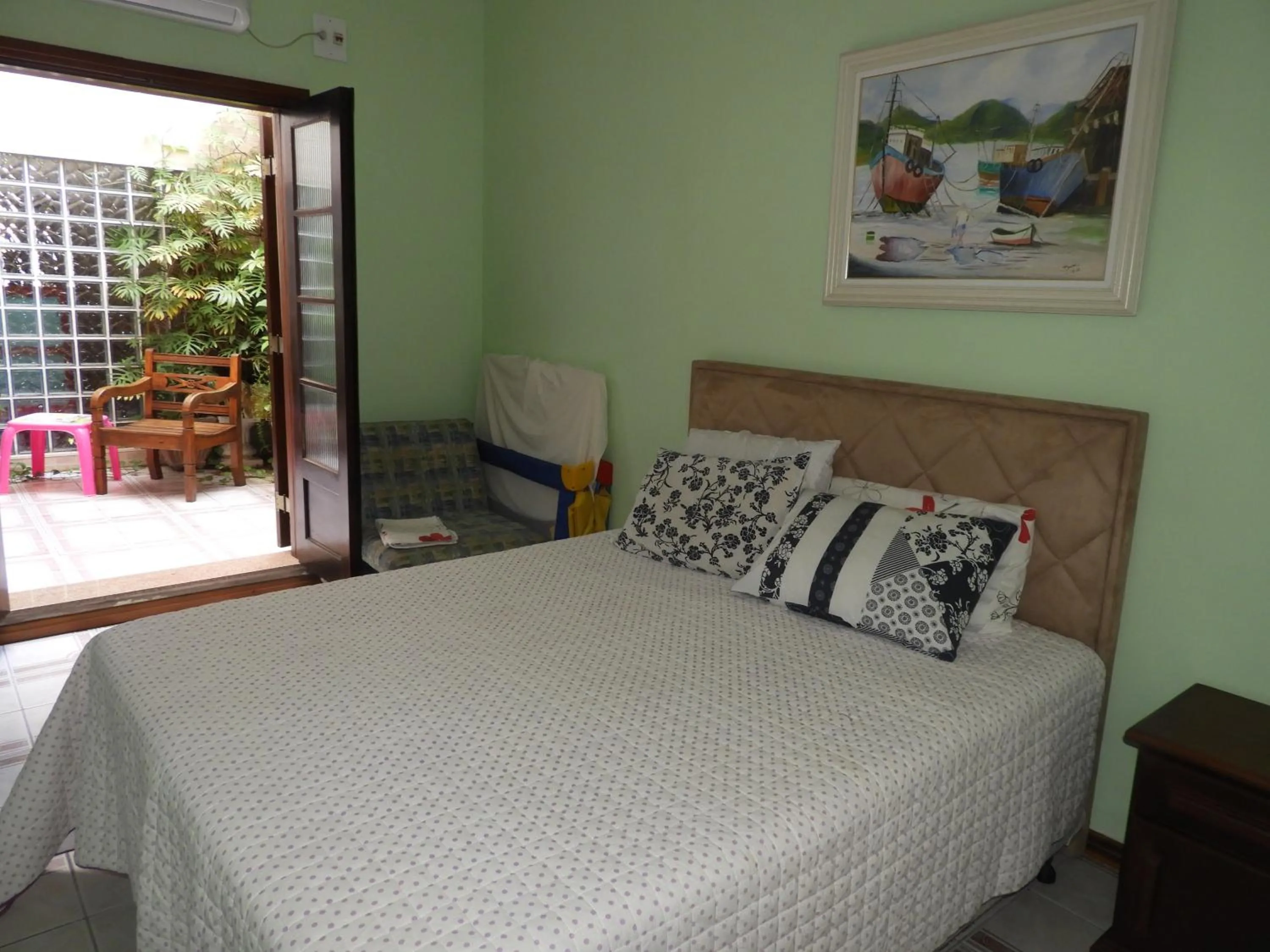 Bed in ACIOLY'S BEACH HOUSE