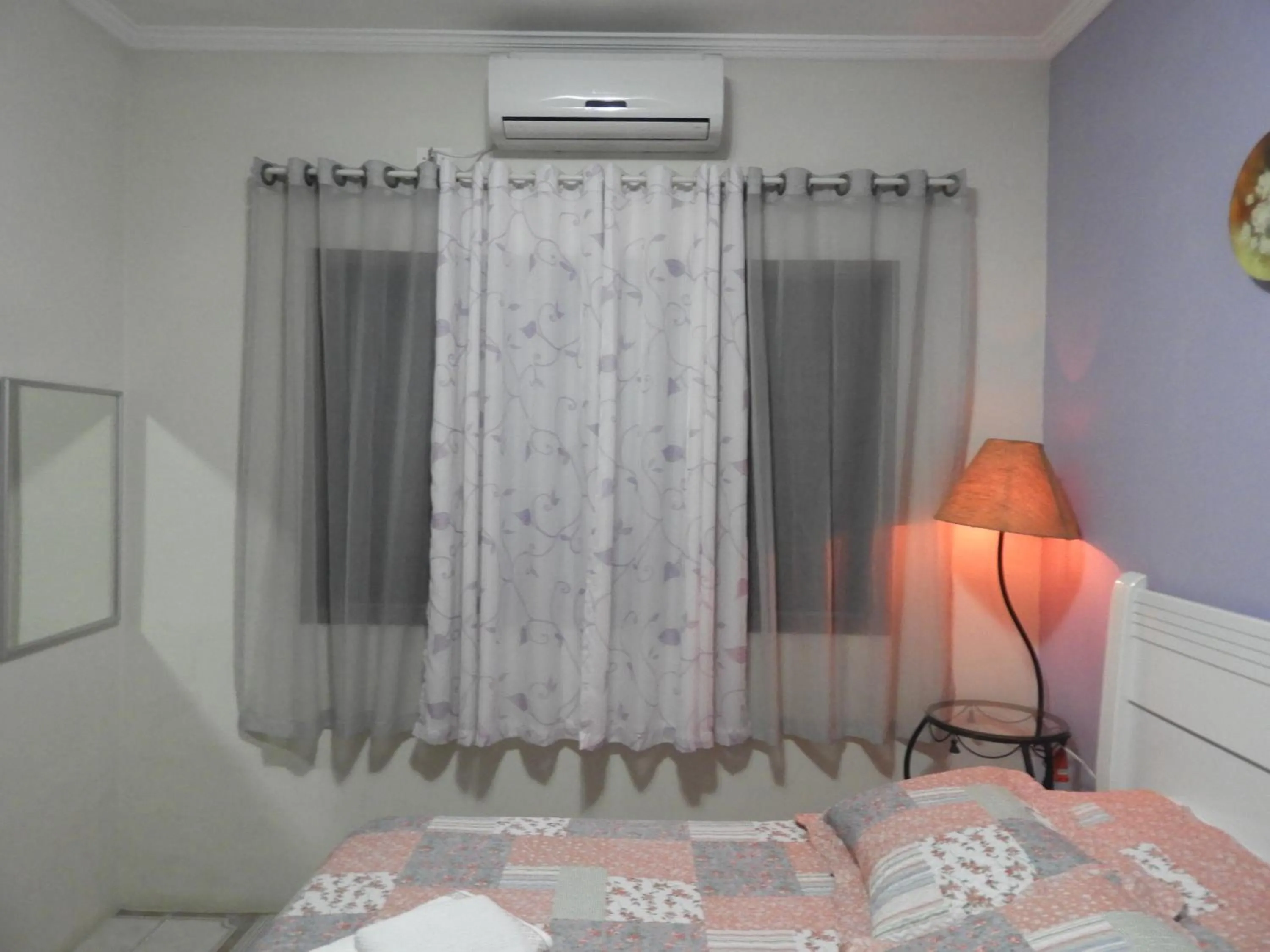Bed in ACIOLY'S BEACH HOUSE