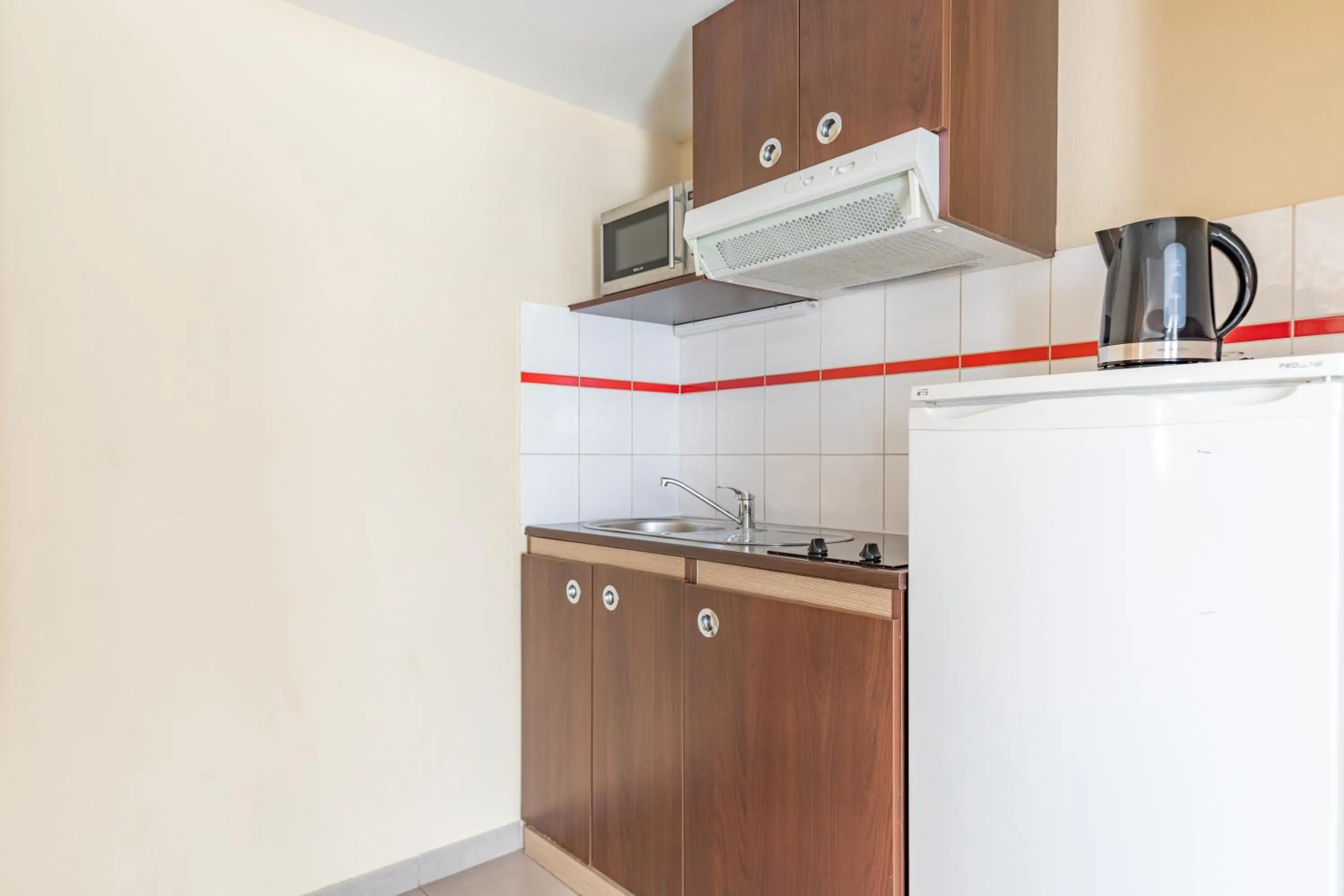 Kitchen or kitchenette in Appart'City Classic Nice Acropolis