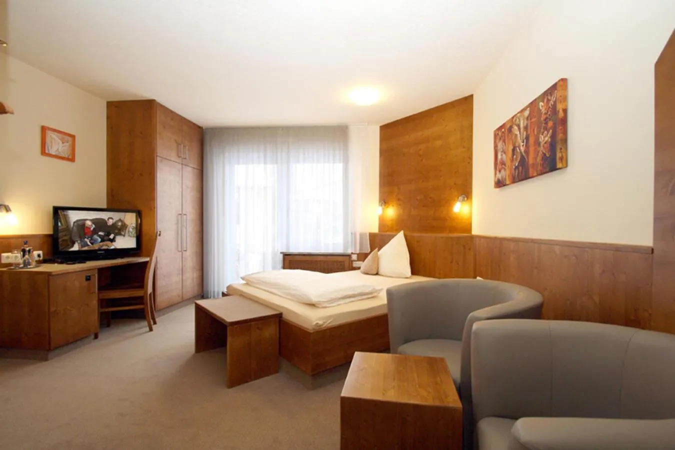 Seating area, Bed in Hotel-Restaurant Gasthaus Bonimeier