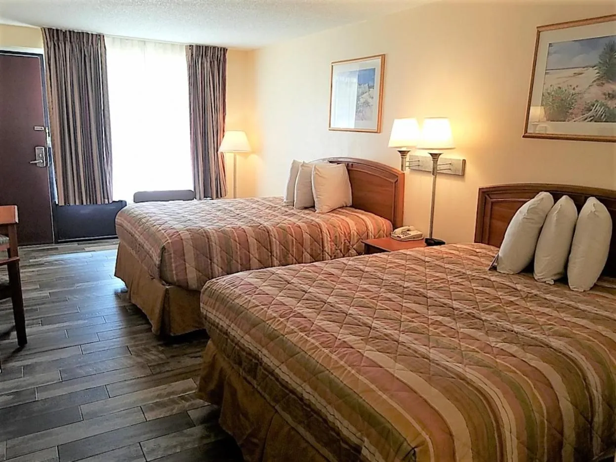 Bed in Americas Best Value Inn Ocean Inn