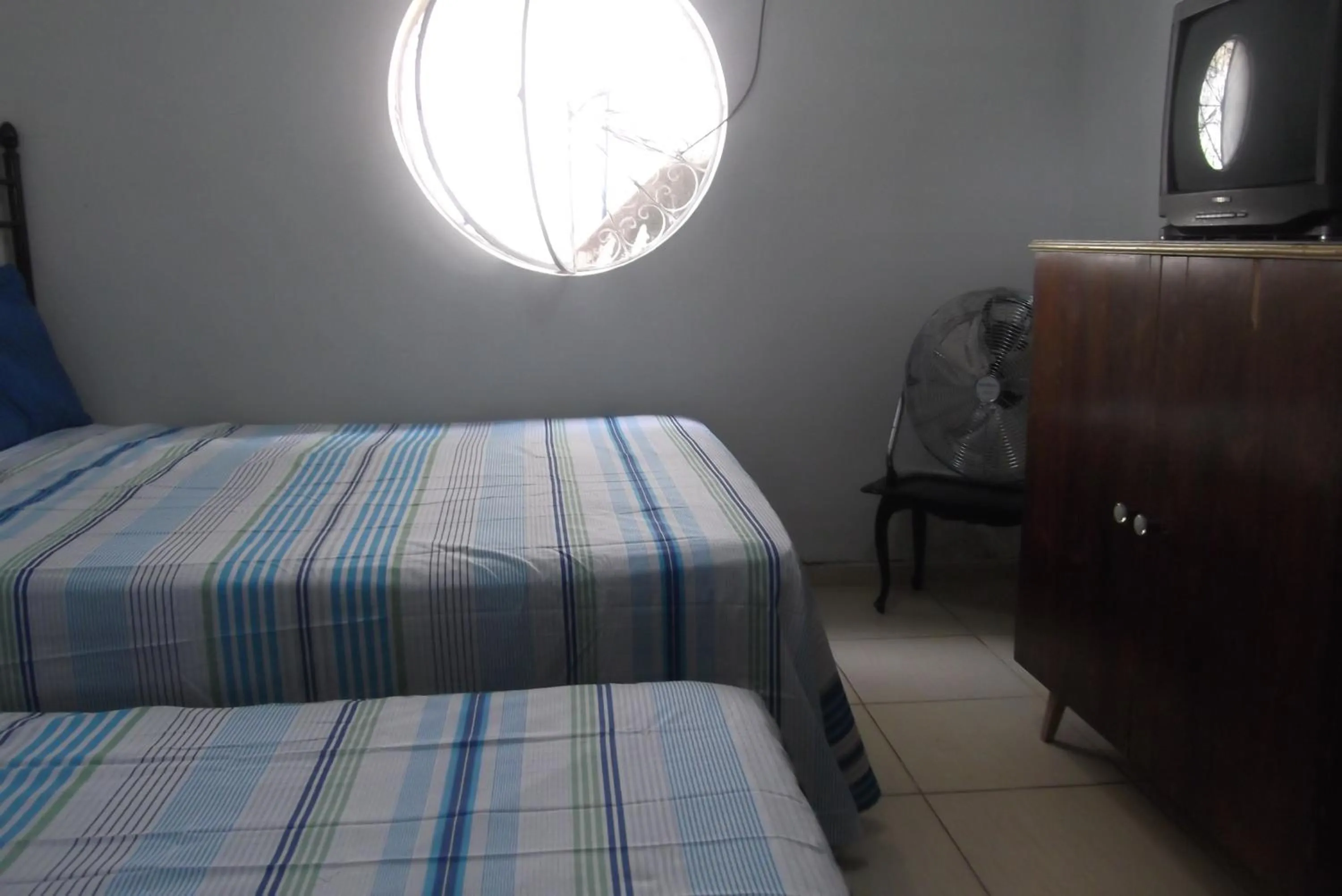 Bed in Tião Botelho Guest House