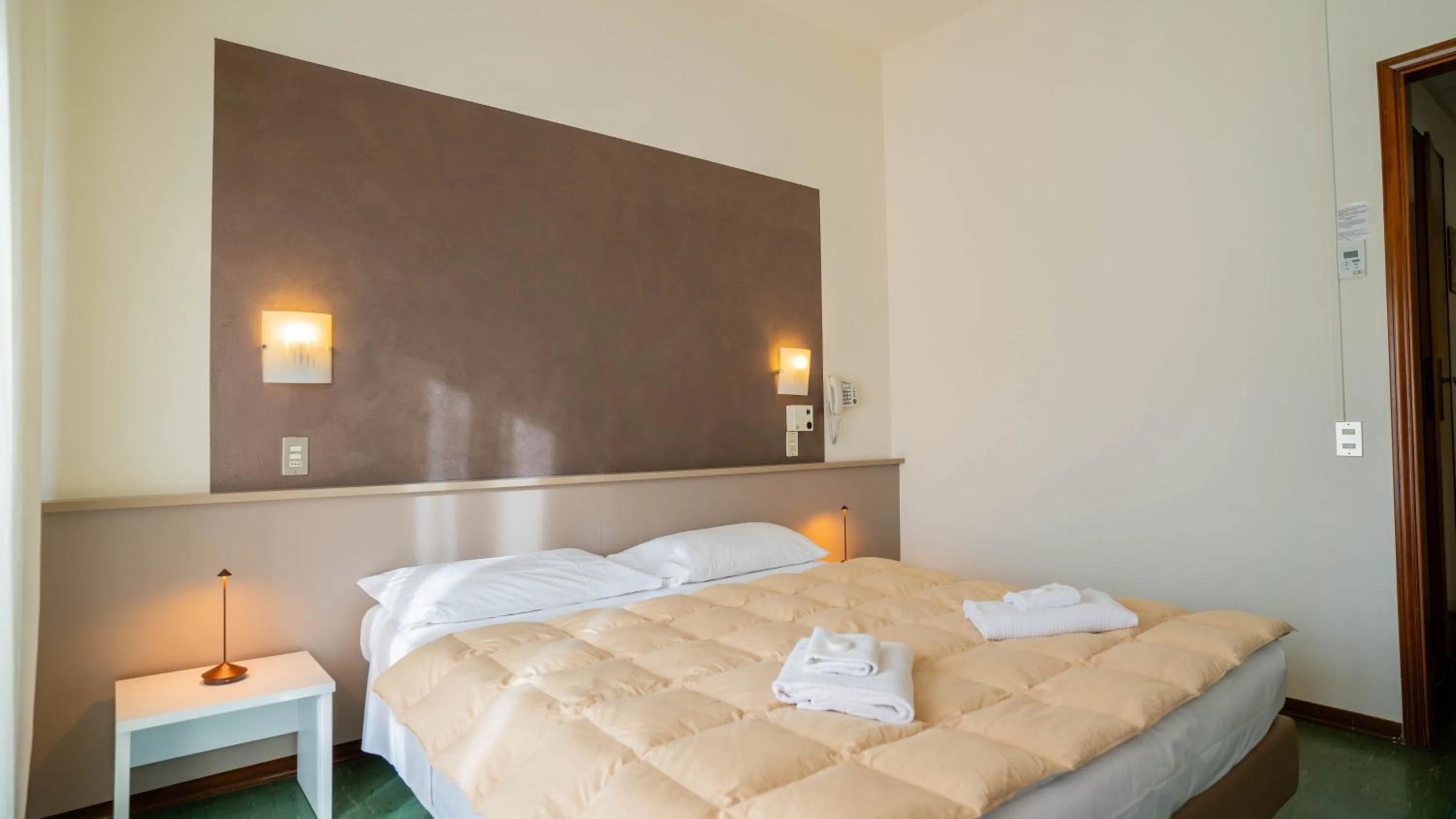 Bed in Hotel Sorriso