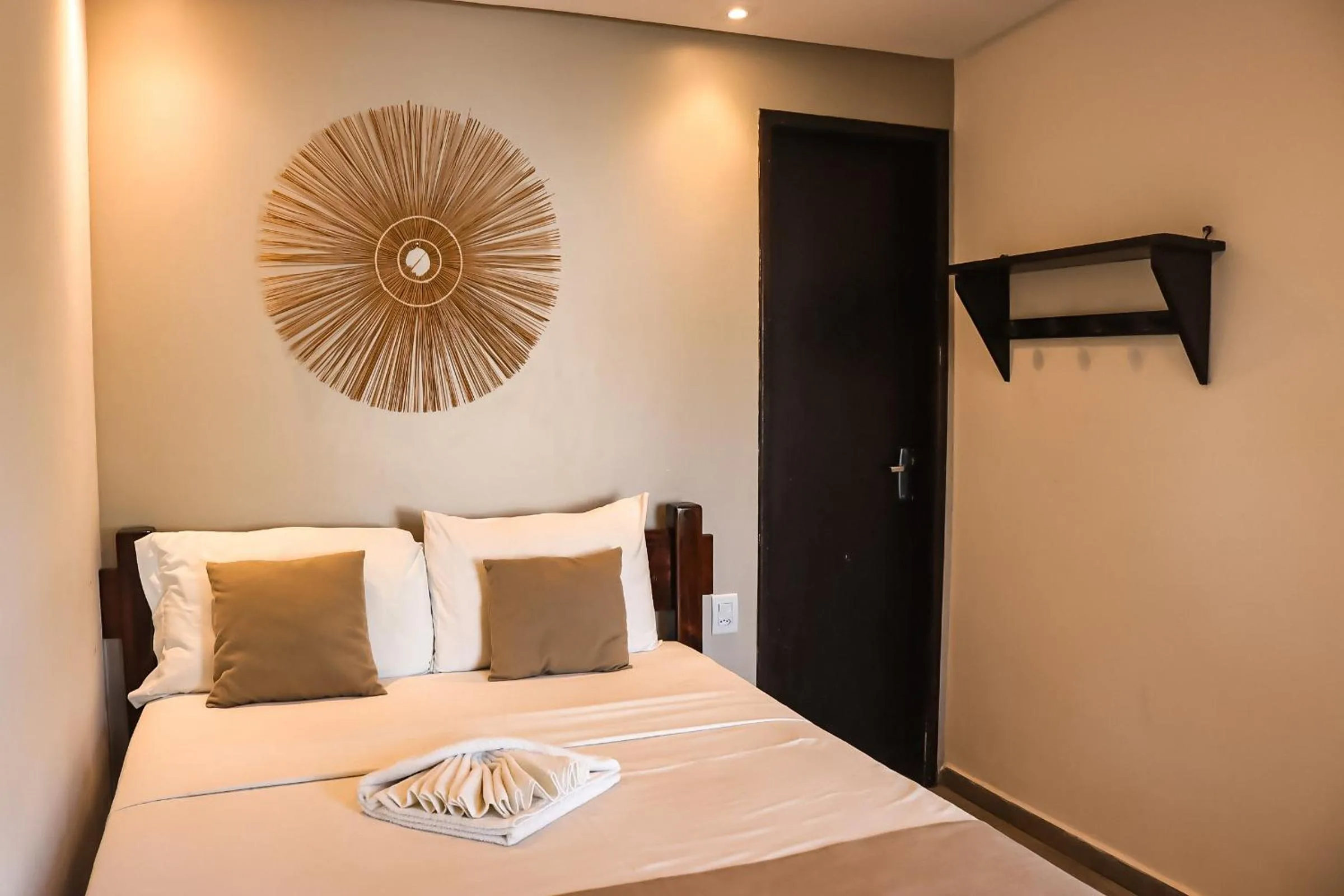 Bed in Pousada dos Coqueiros