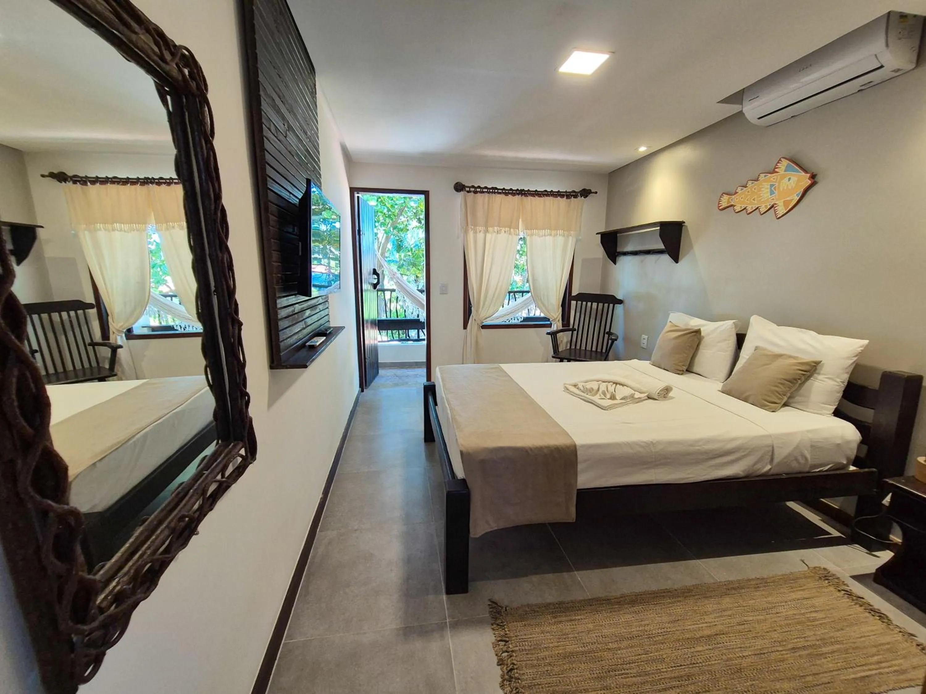 Bed in Pousada dos Coqueiros