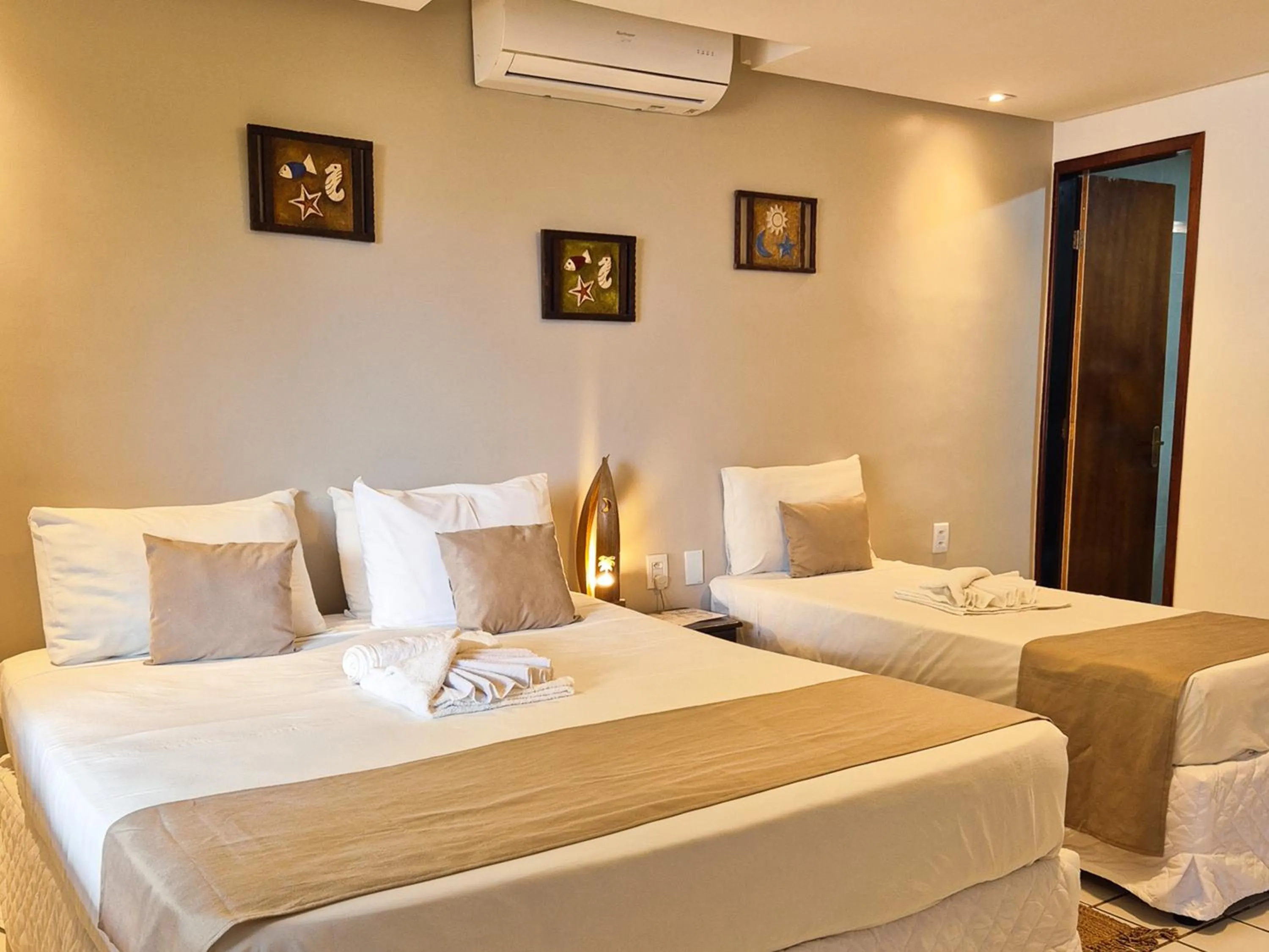 Bed in Pousada dos Coqueiros