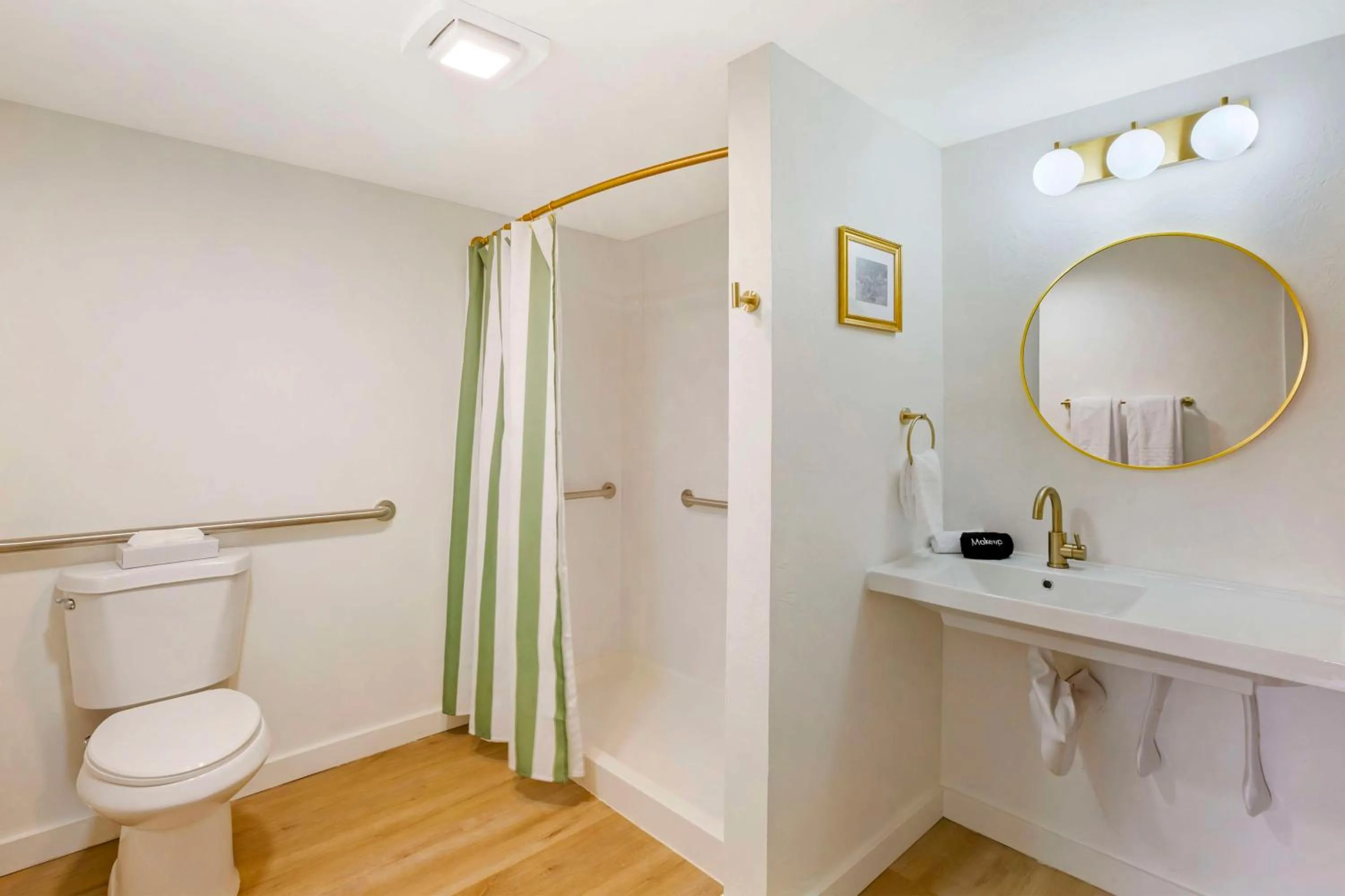 Bathroom in The Kennedy Tucson, SureStay Collection by Best Western