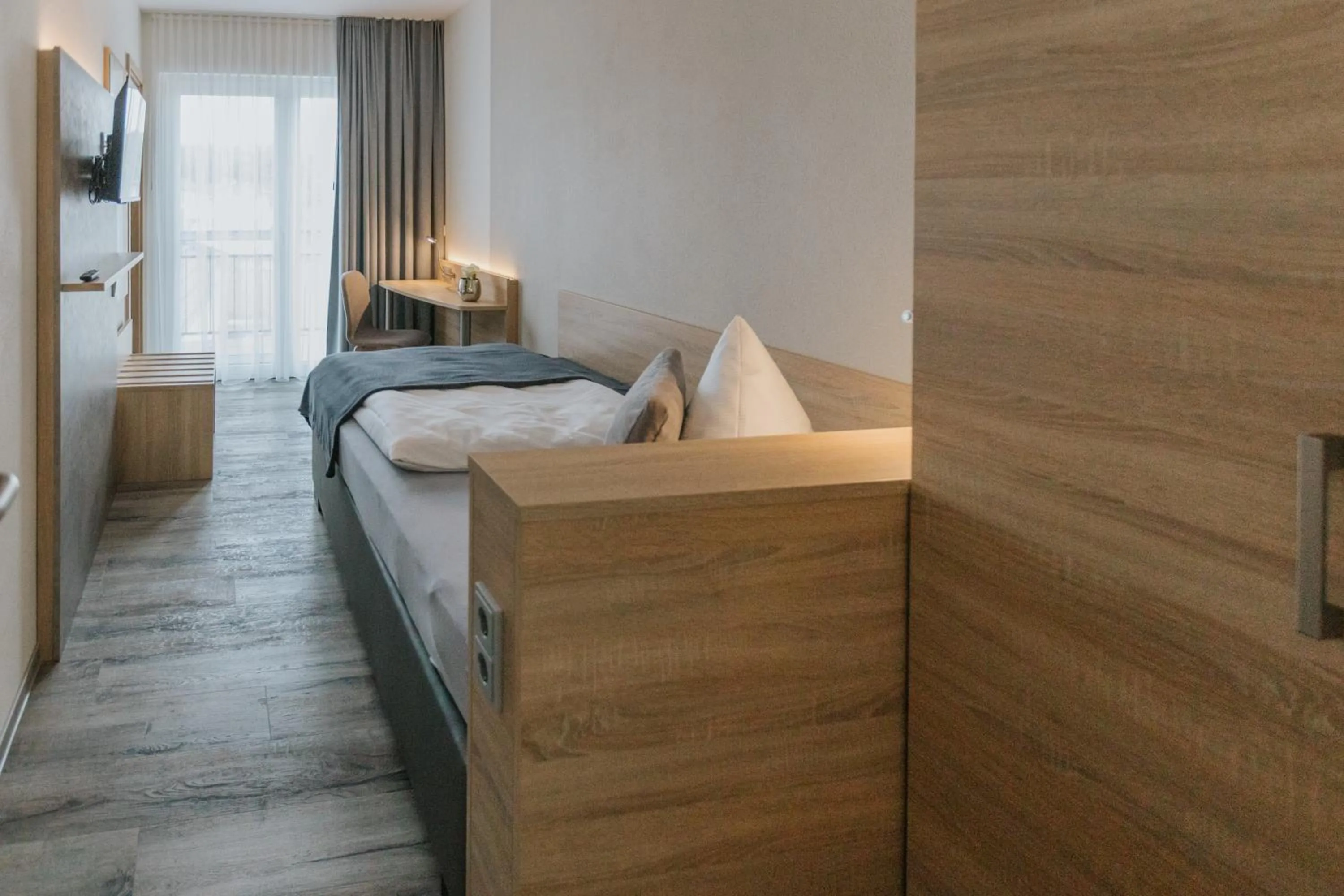 Bed in Casamia Hotel Spremberg