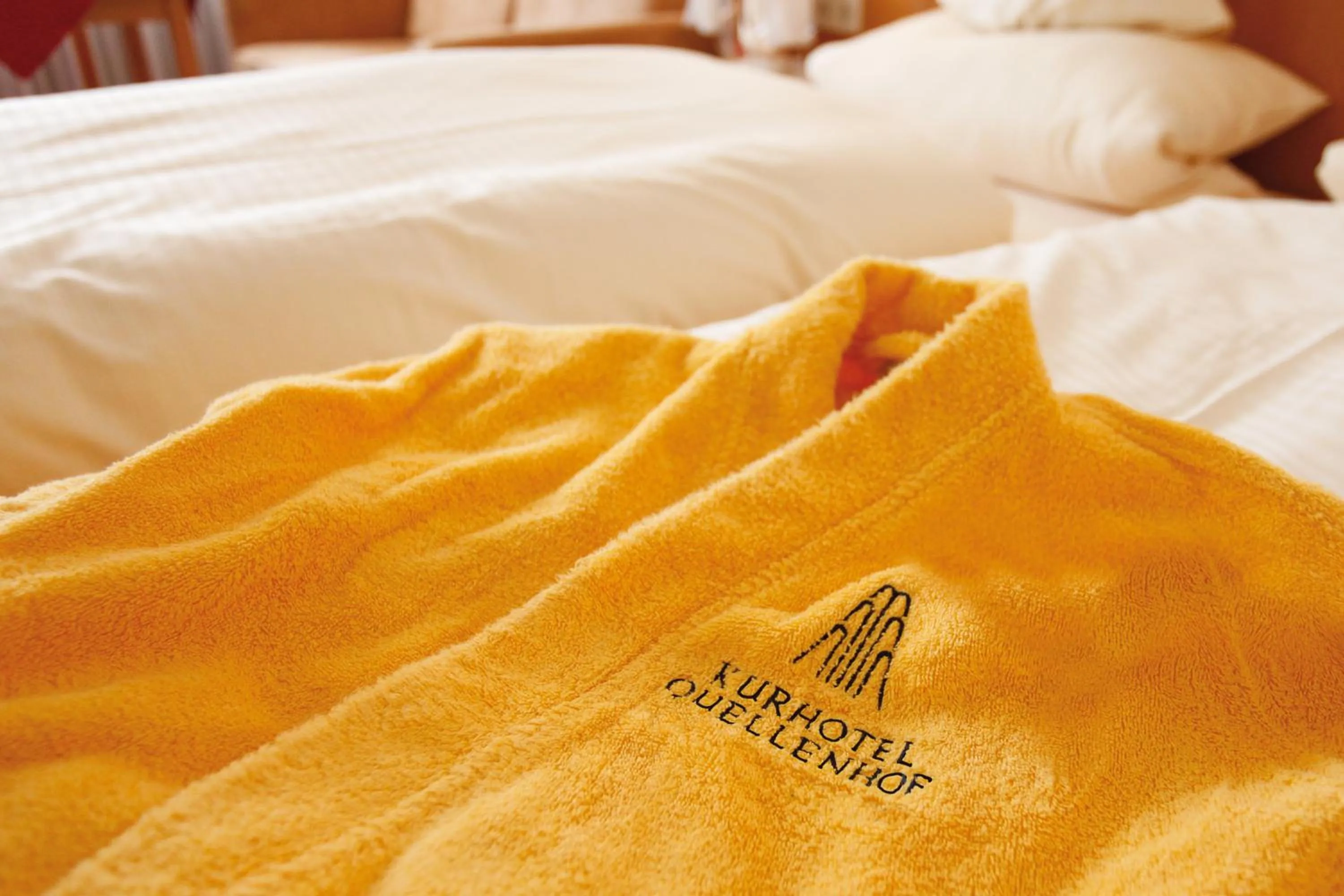 Bed in Hotel Quellenhof