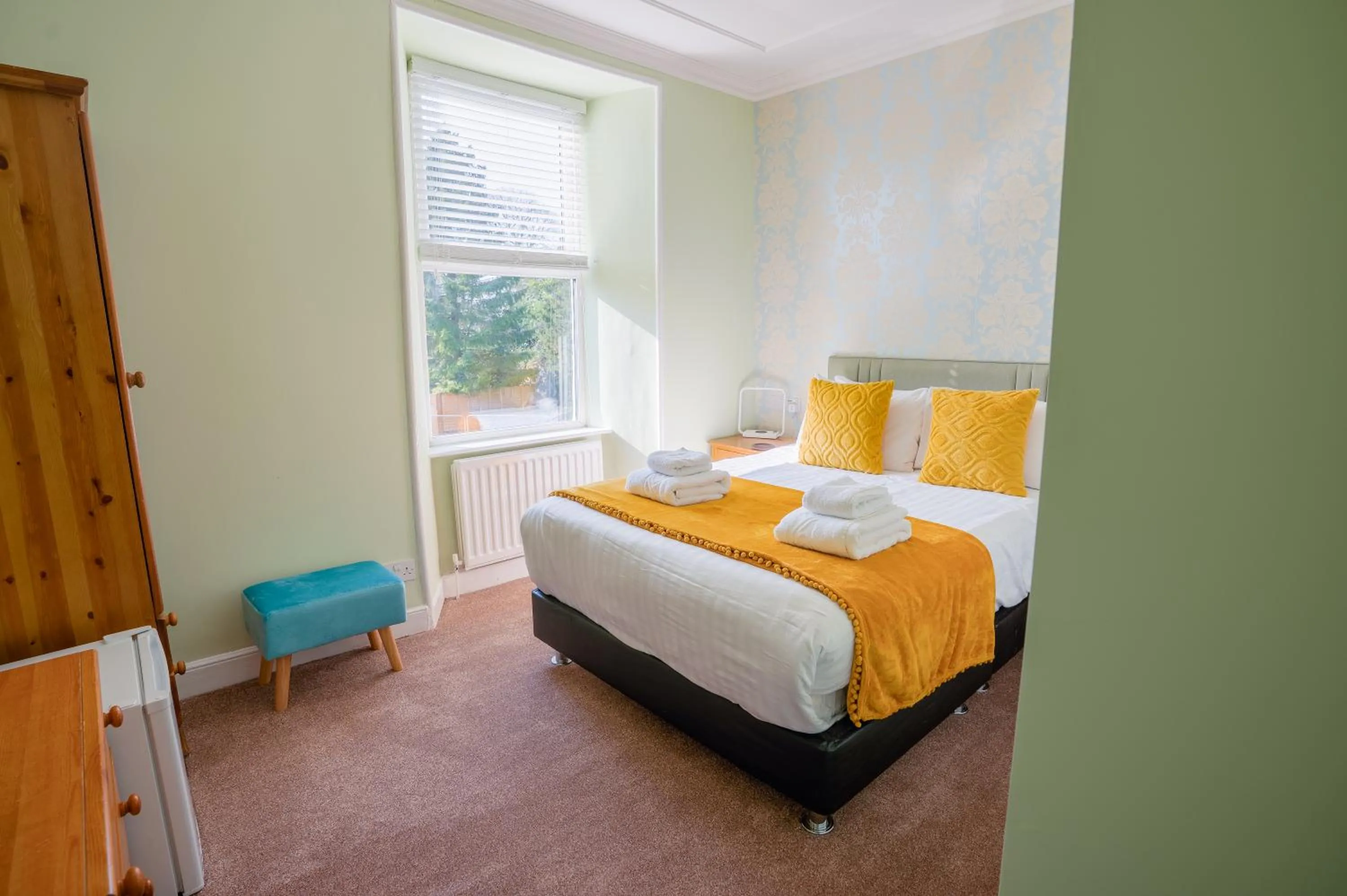 Photo of the whole room, Bed in The Cottage