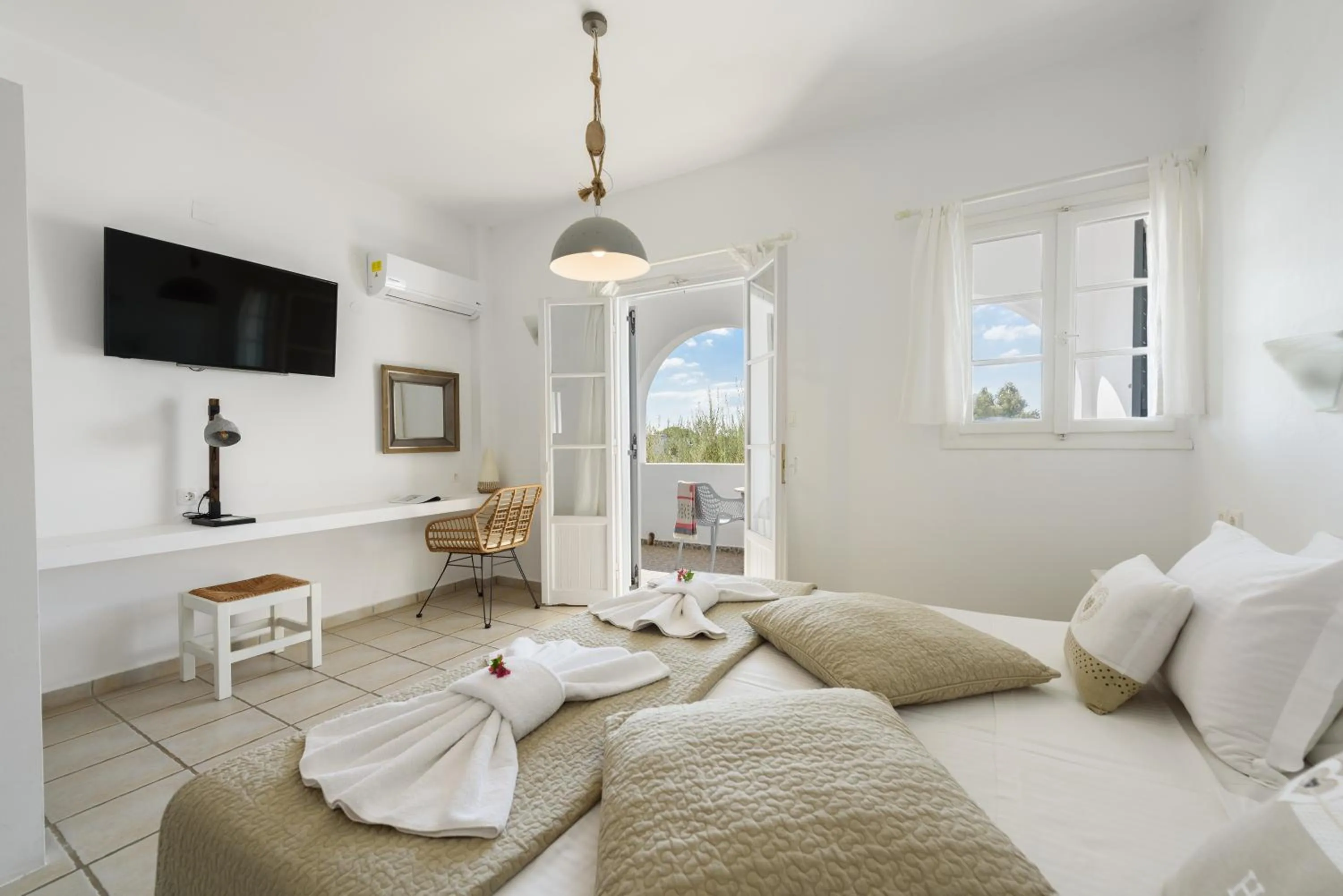 Bed in Anixis Studios Aliki Paros