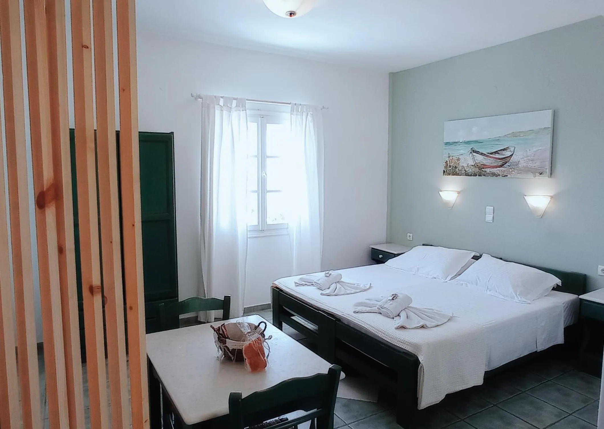 Bed in Anixis Studios Aliki Paros