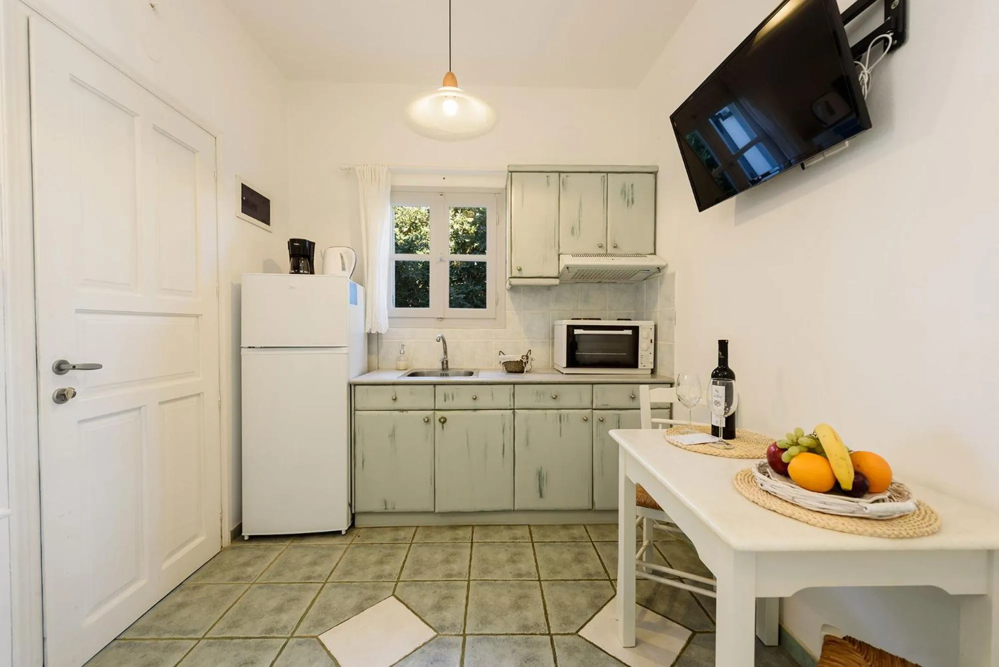 Kitchen or kitchenette in Anixis Studios Aliki Paros