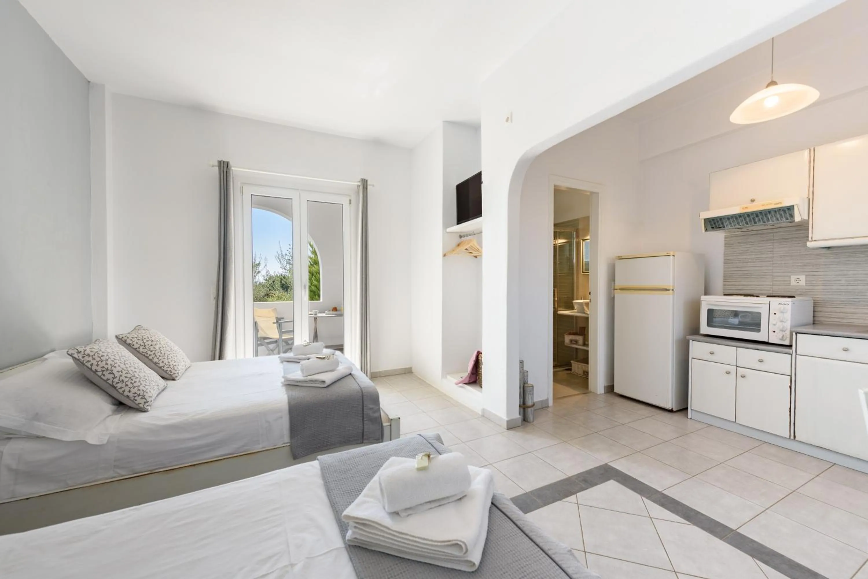 Bed in Anixis Studios Aliki Paros