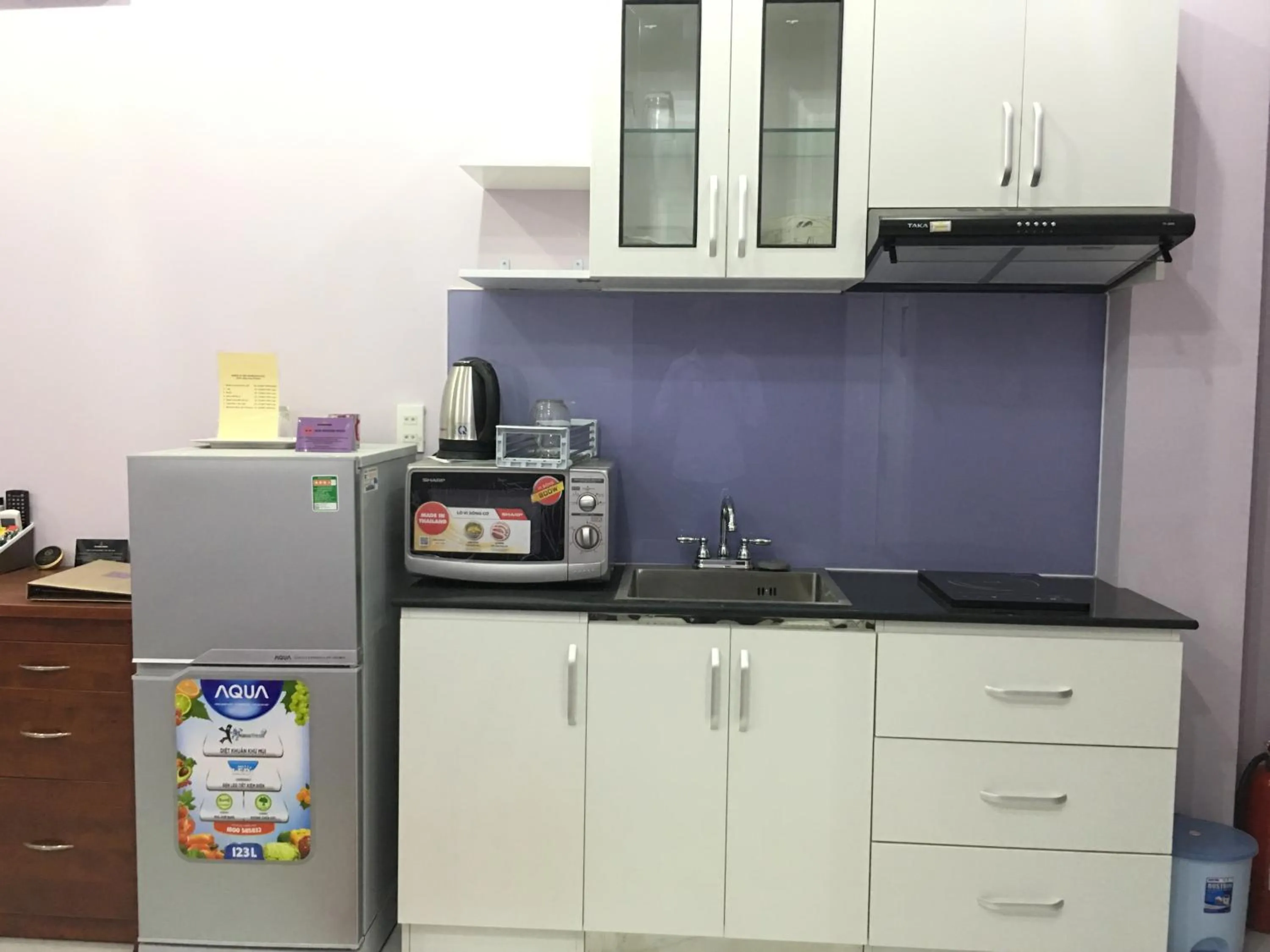 Kitchen or kitchenette in HT Hotel Apartment