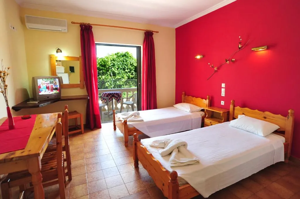 Photo of the whole room, Bed in Apartments Corfu Sun Pool Side