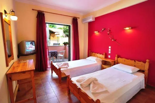 Photo of the whole room, Bed in Apartments Corfu Sun Pool Side