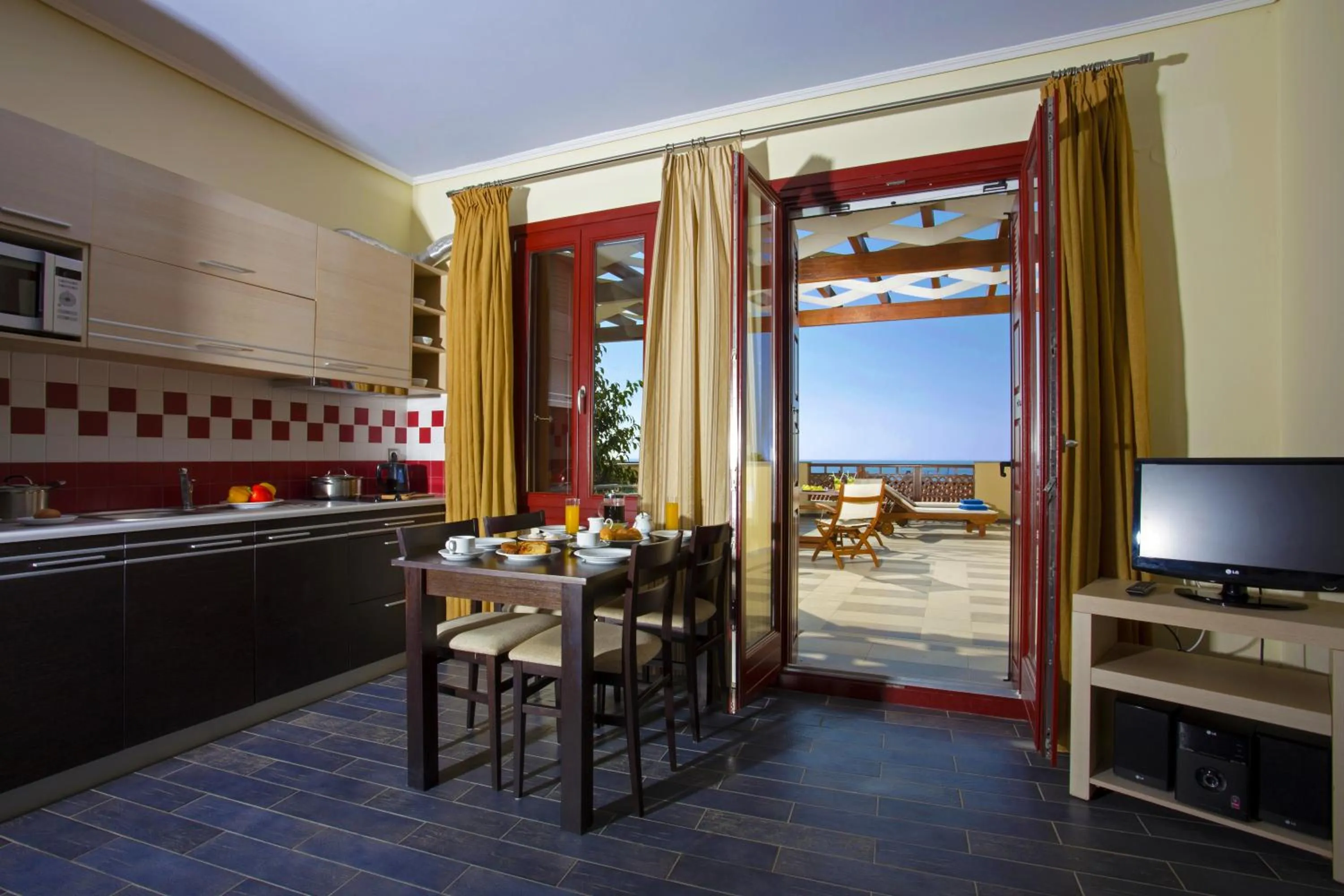 Kitchen or kitchenette in Sirena Residence & Spa