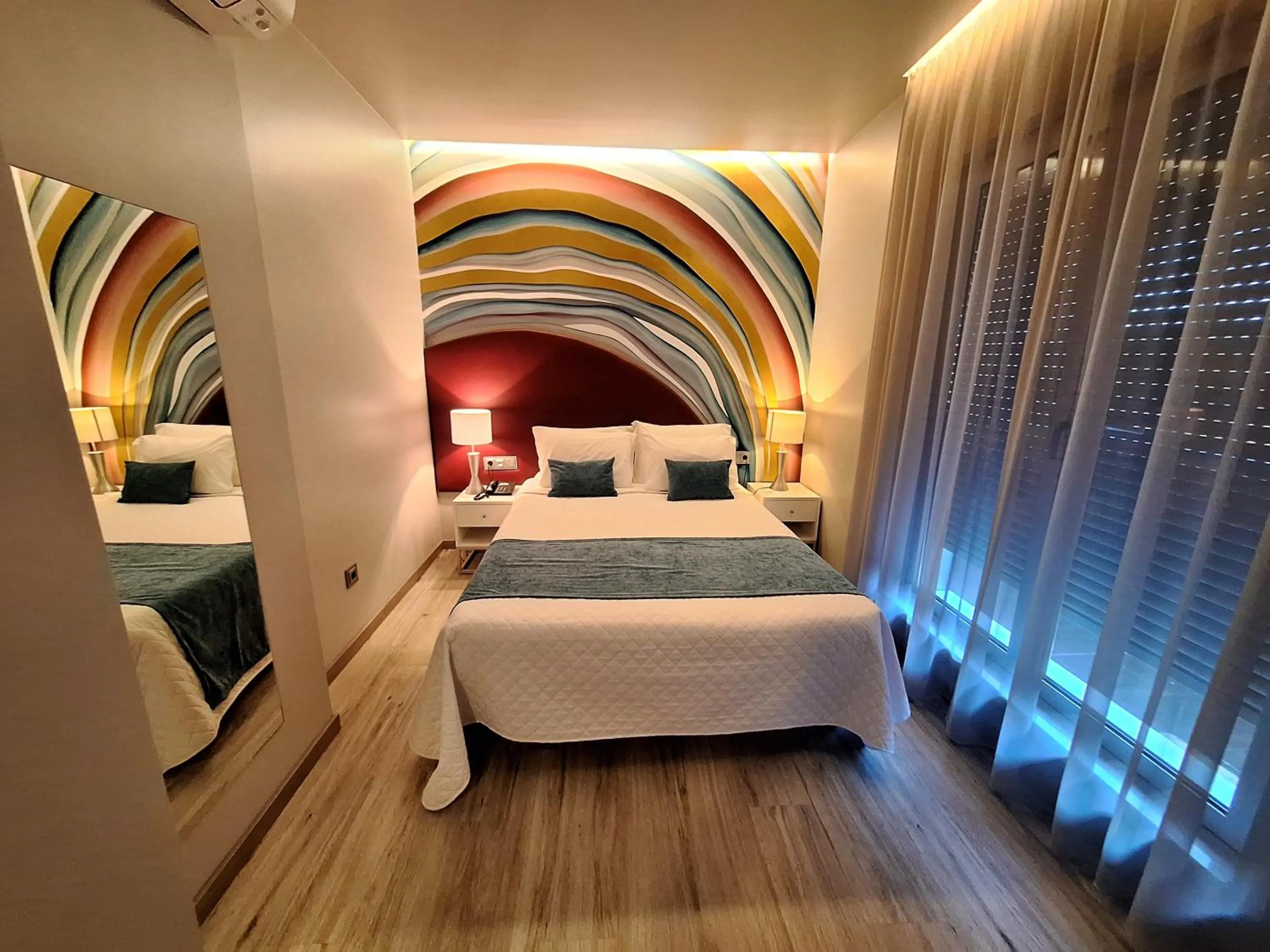 Balcony/Terrace, Bed in Hotel Aleluia