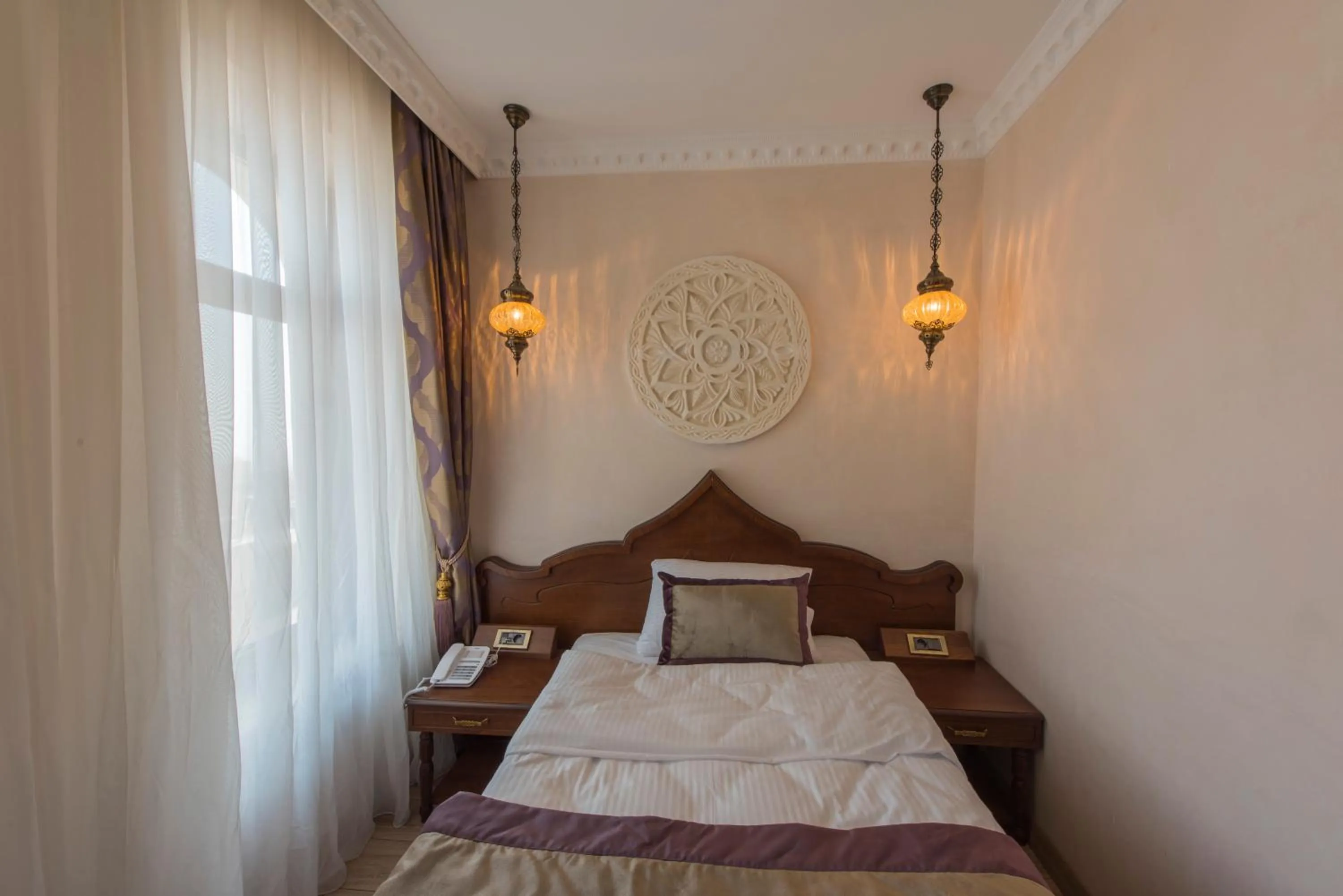 Bed in Kaya Ninova Hotel