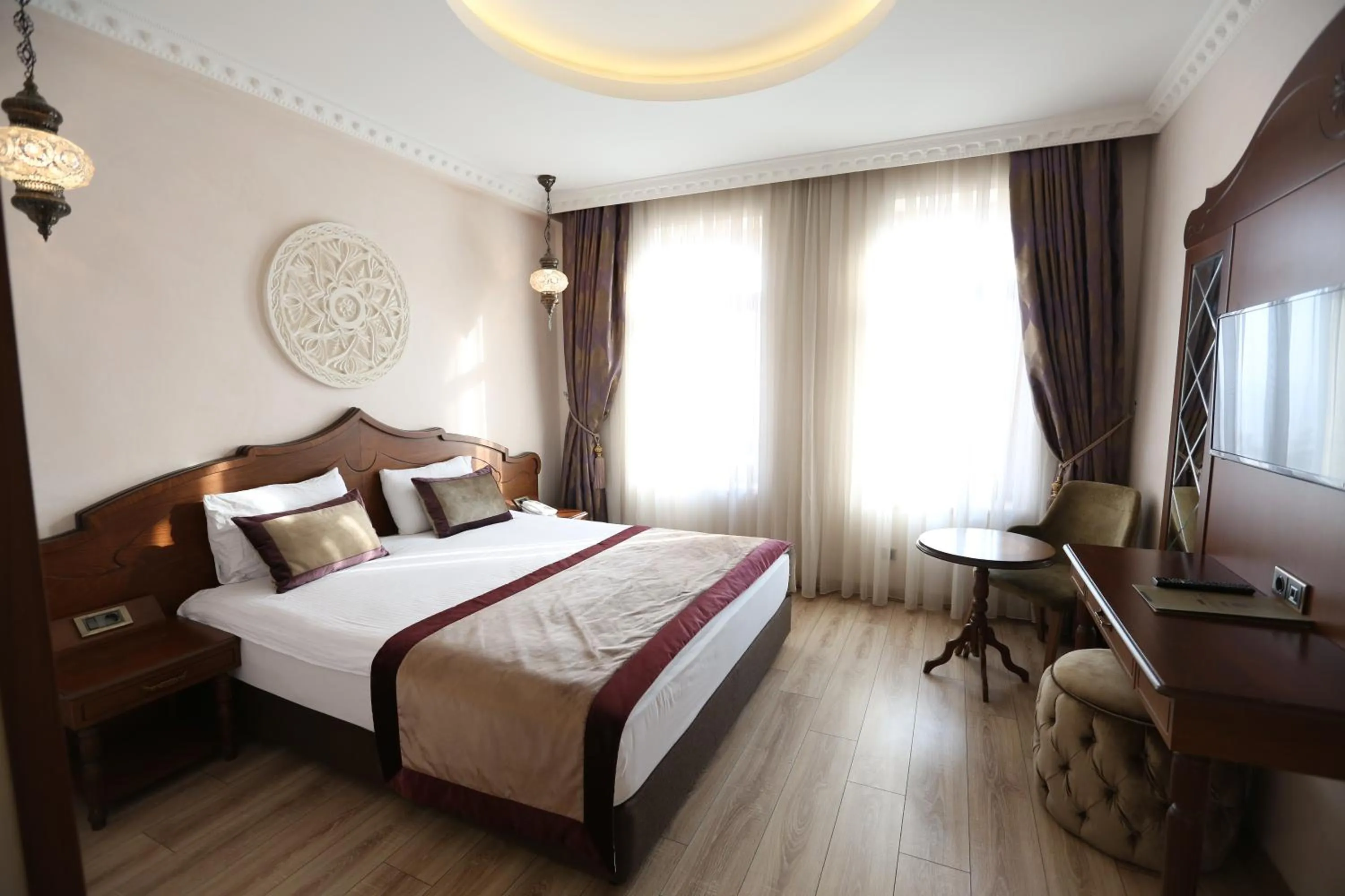 Bed in Kaya Ninova Hotel