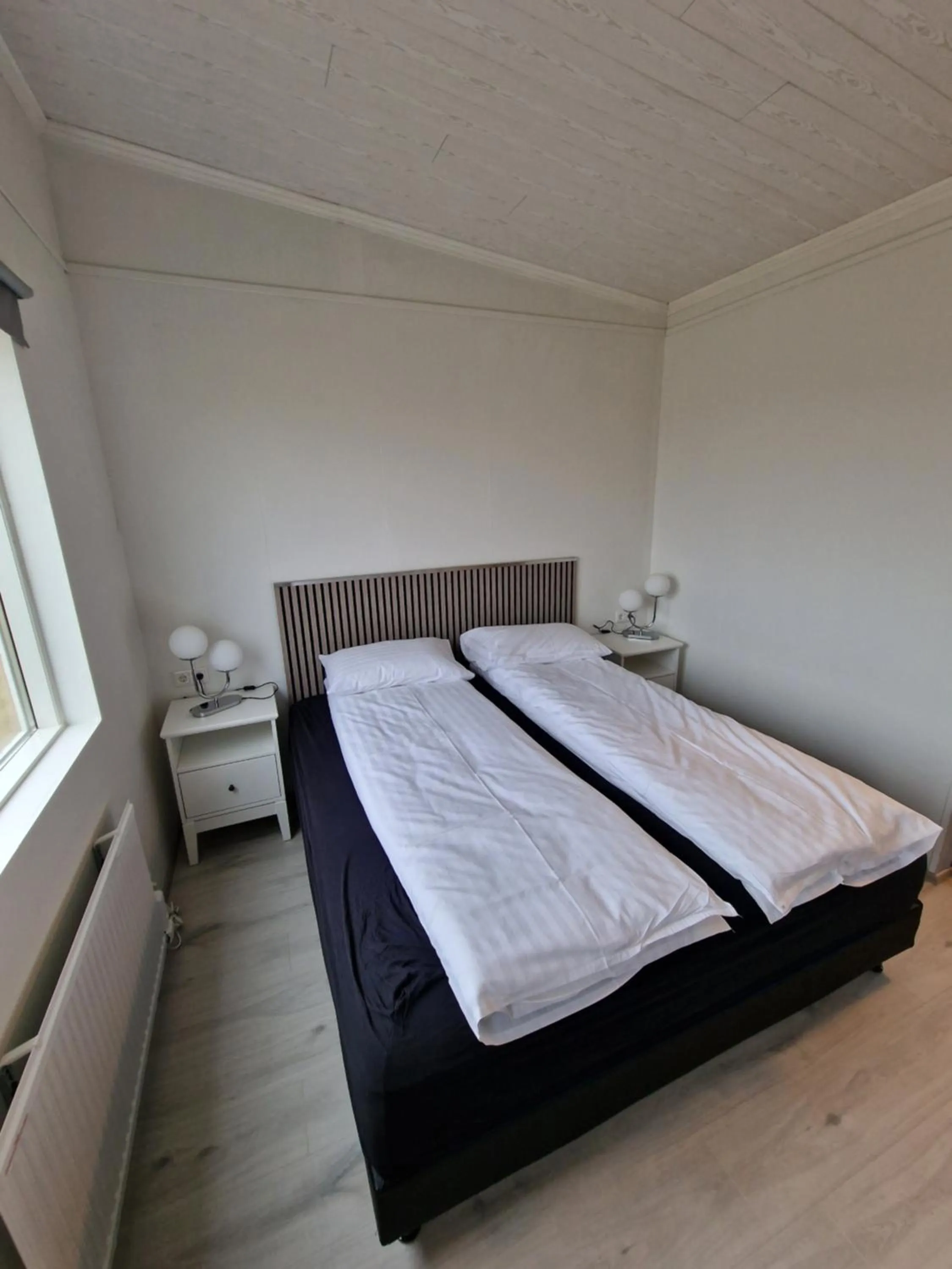 Bed in Aurora Cabins