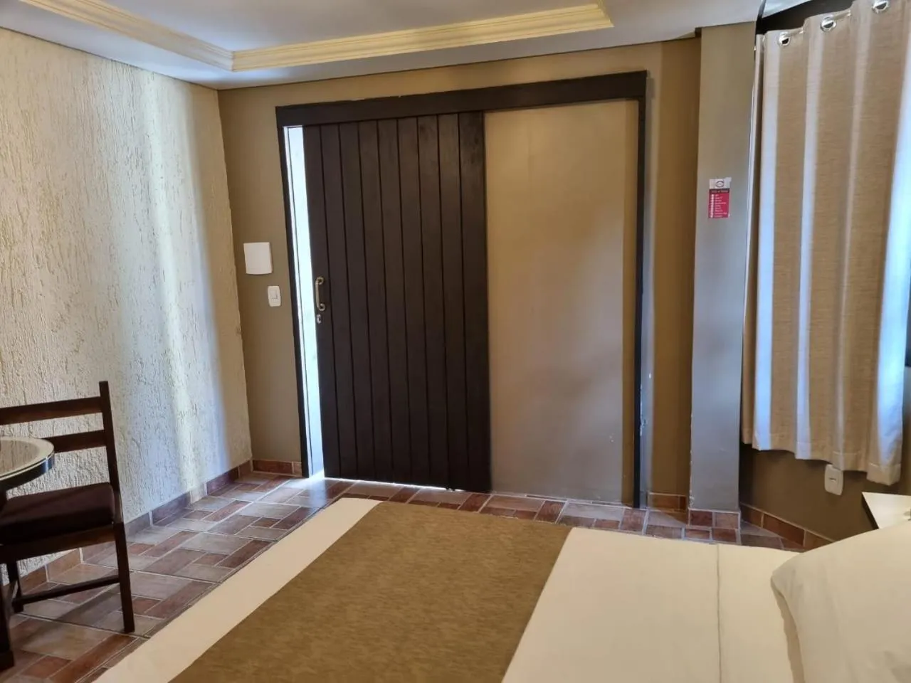 Facade/entrance, Bed in Pousada Caliandra Da Serra