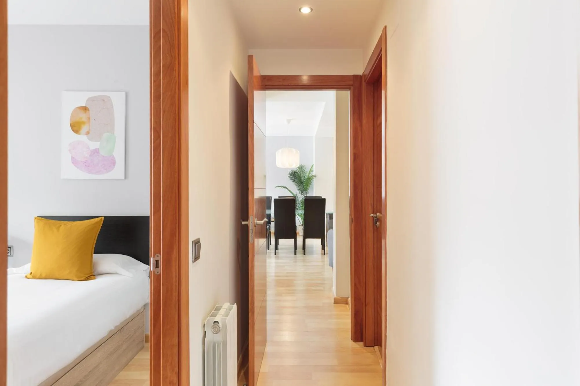 Bed in Lucas House Apartments by Sitges Group