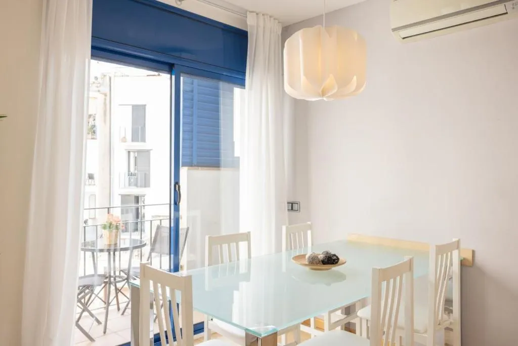 Living room in Lucas House Apartments by Sitges Group