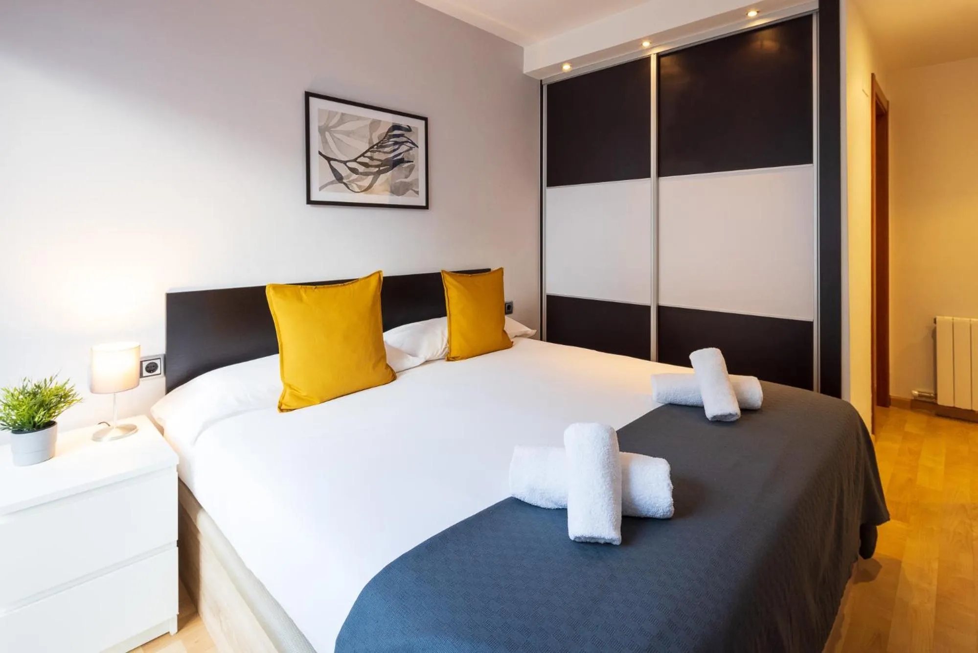 Bed in Lucas House Apartments by Sitges Group