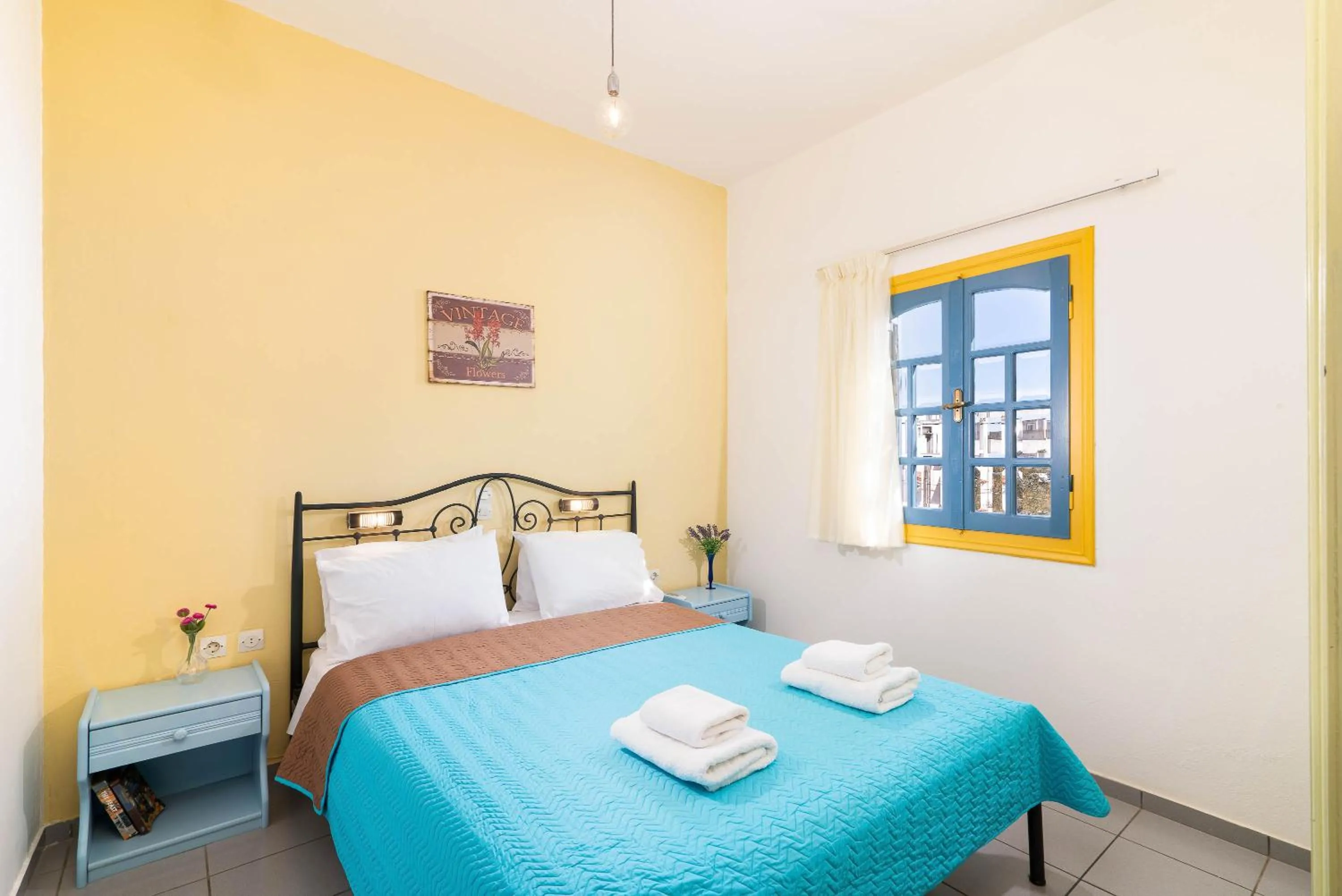 Bed in Afroditi Apartments