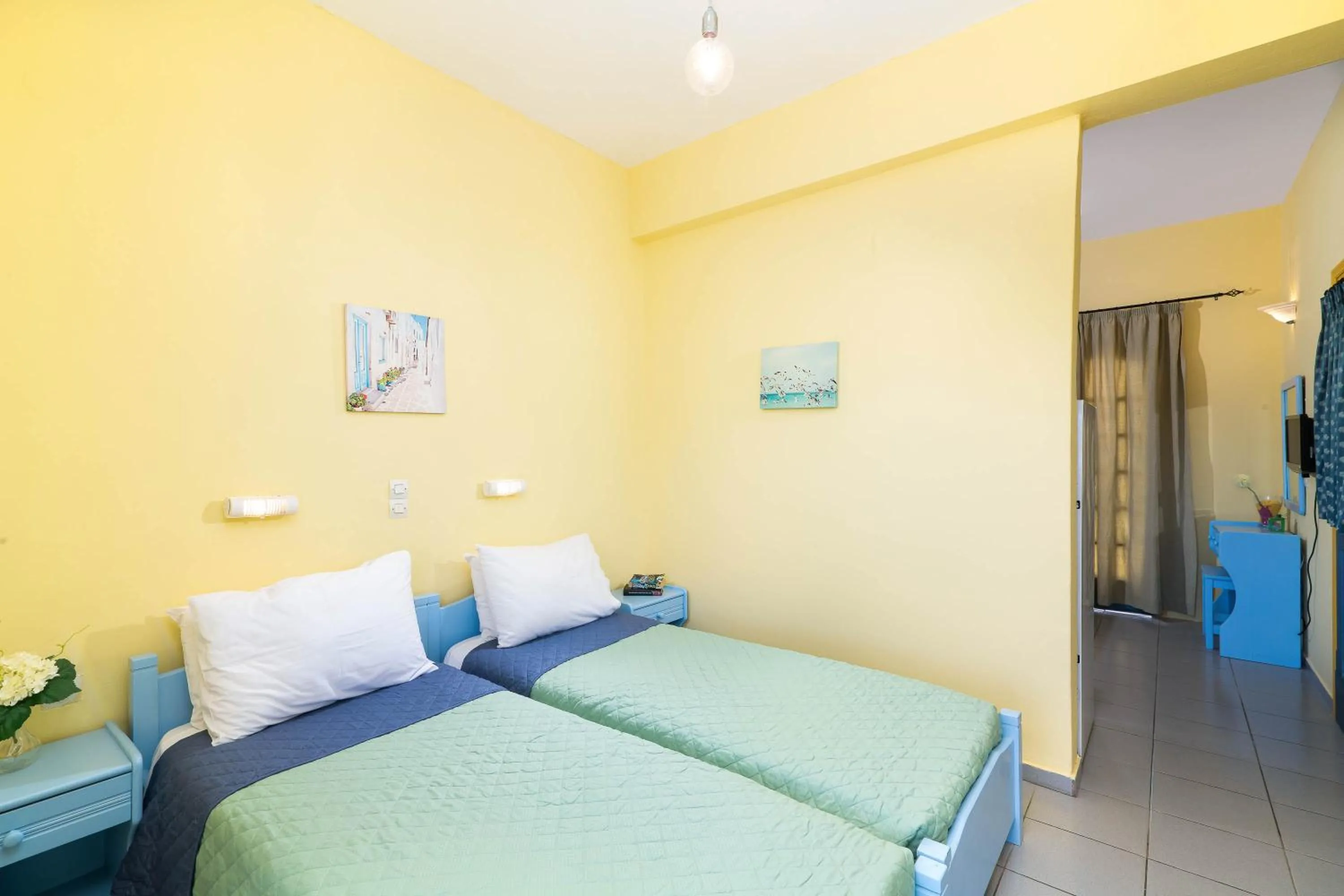 Bed in Afroditi Apartments