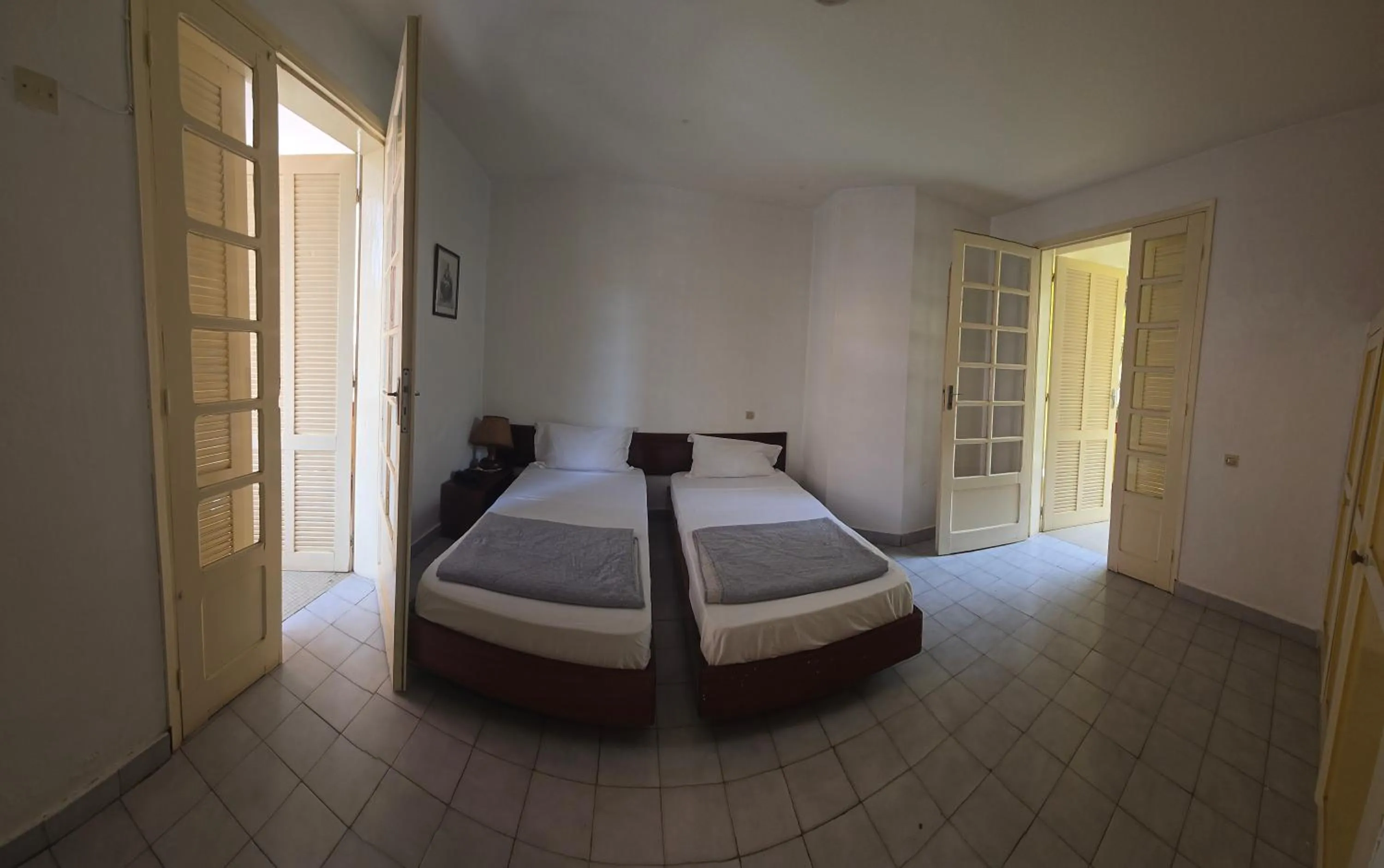 Bed in Hôtel Saint-Louis Sun Dakar