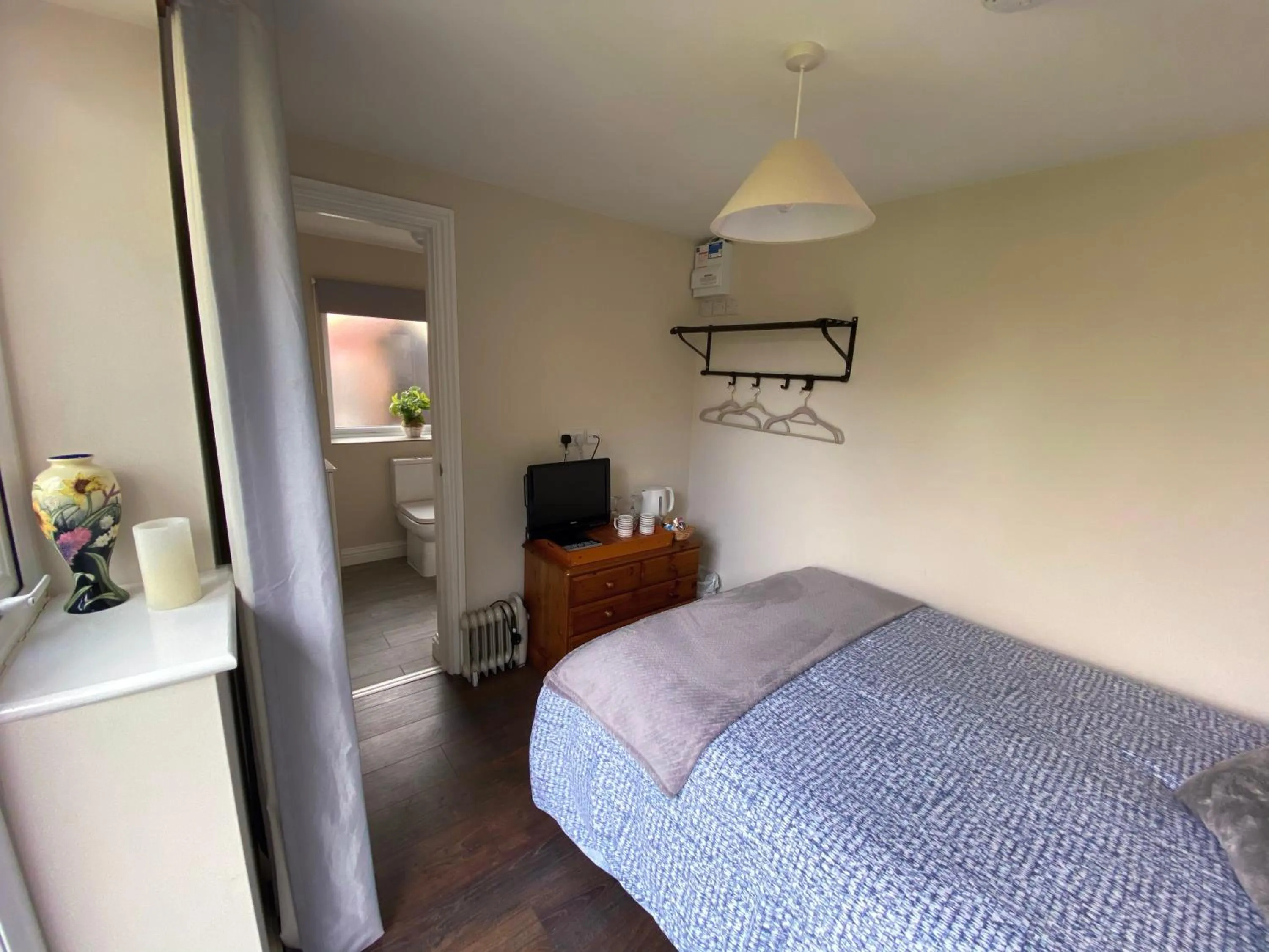 Bed in The Rose Cottage Inn