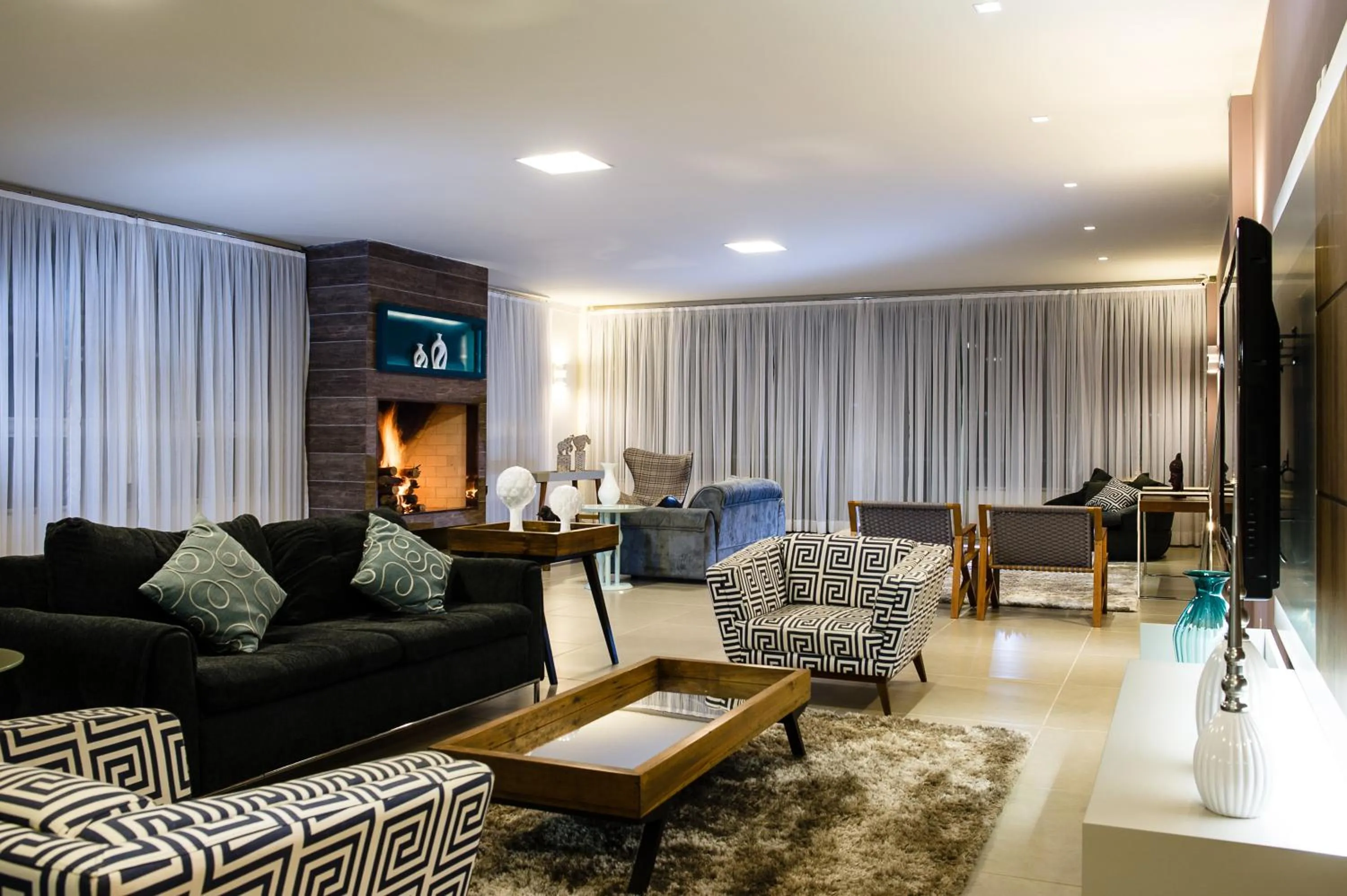 Communal lounge/ TV room in Hotel Vila Verde