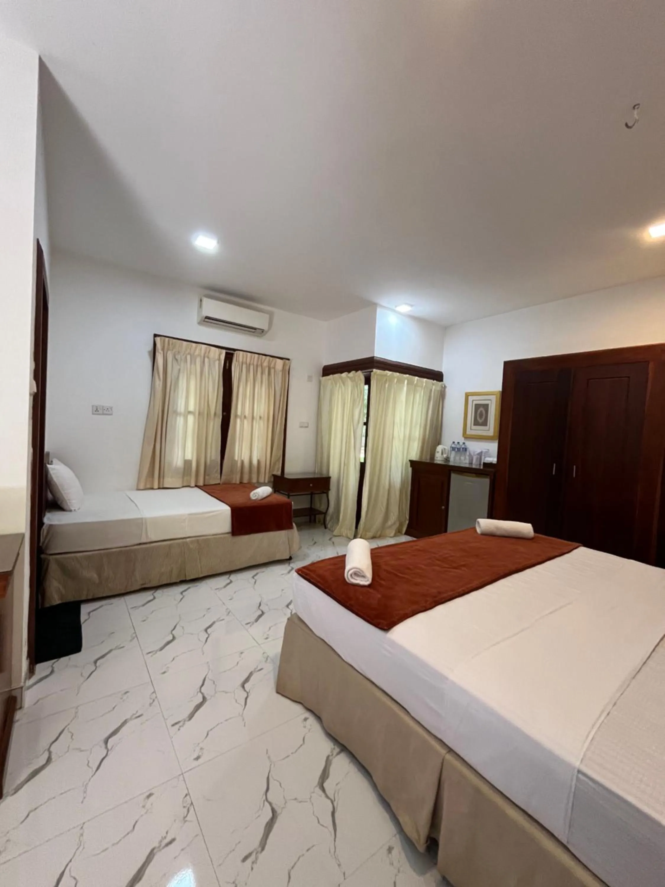 Bed in Hotel 4 U Saliya Garden