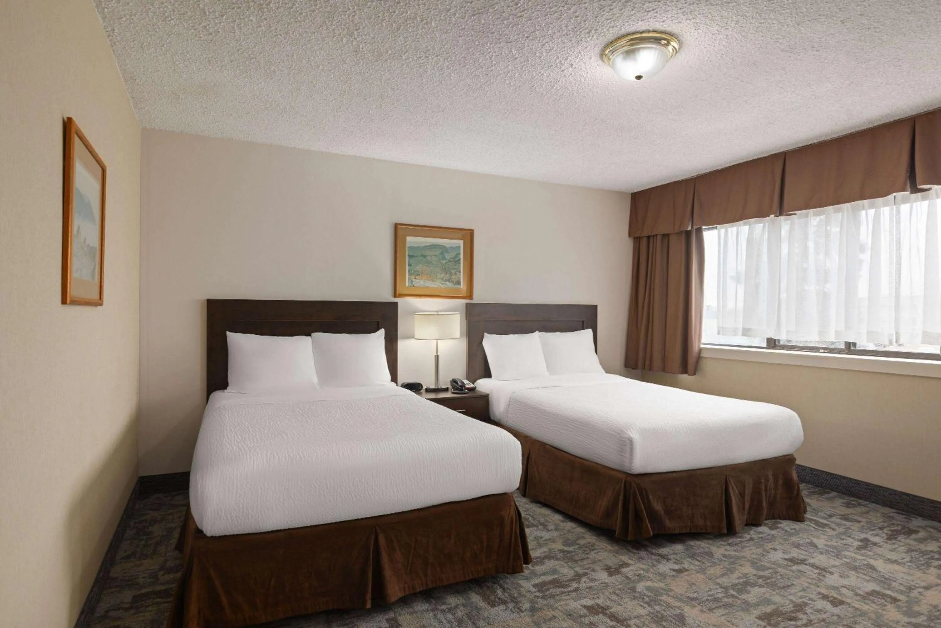 Photo of the whole room, Bed in Travelodge by Wyndham Thunder Bay ON