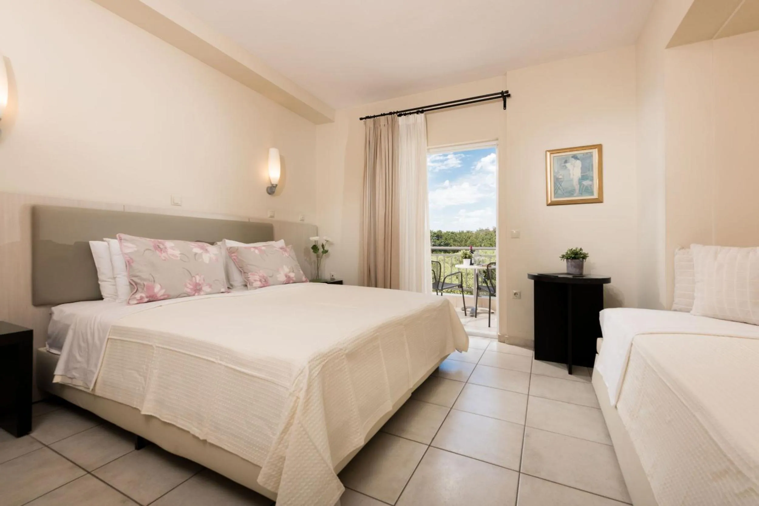 Bed in Louloudis Boutique Hotel