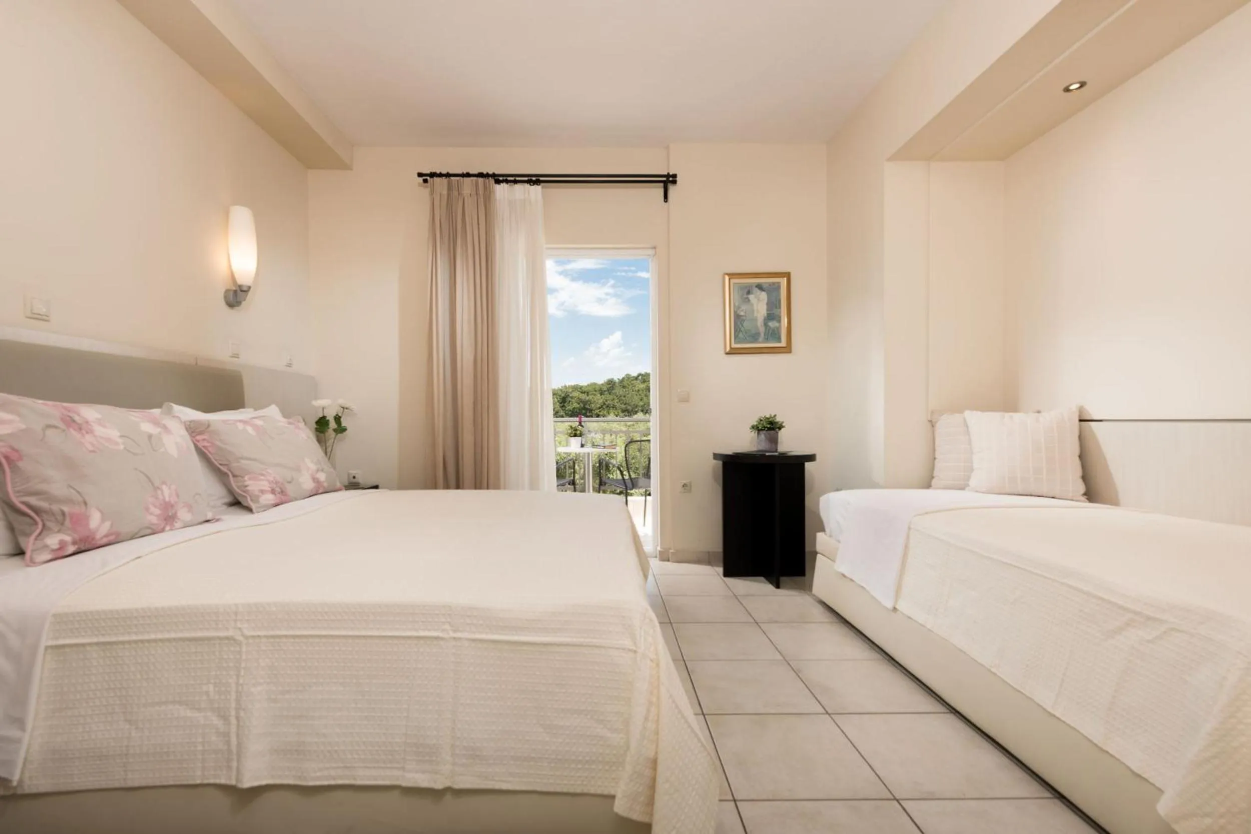 Bed in Louloudis Boutique Hotel