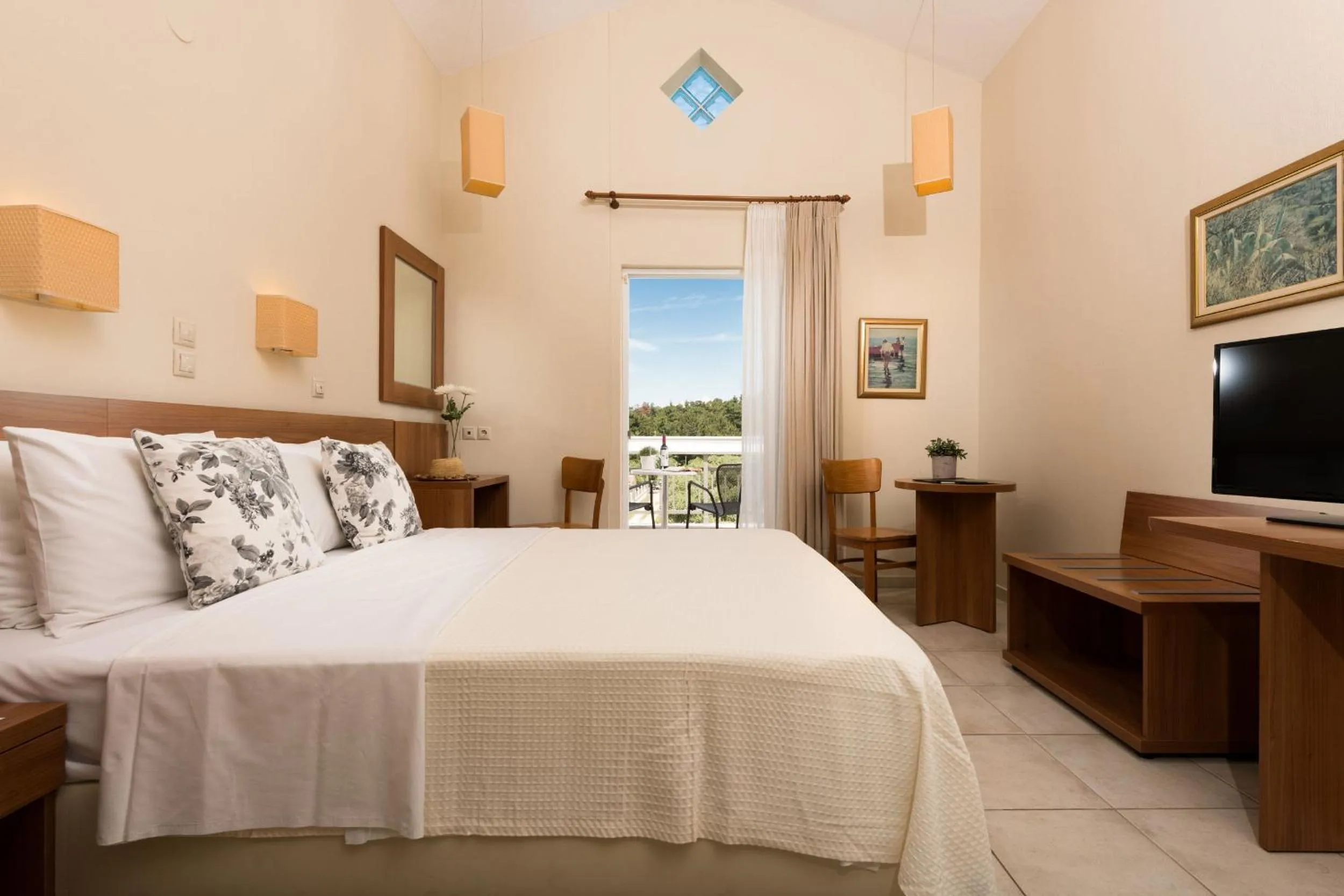 Bed in Louloudis Boutique Hotel