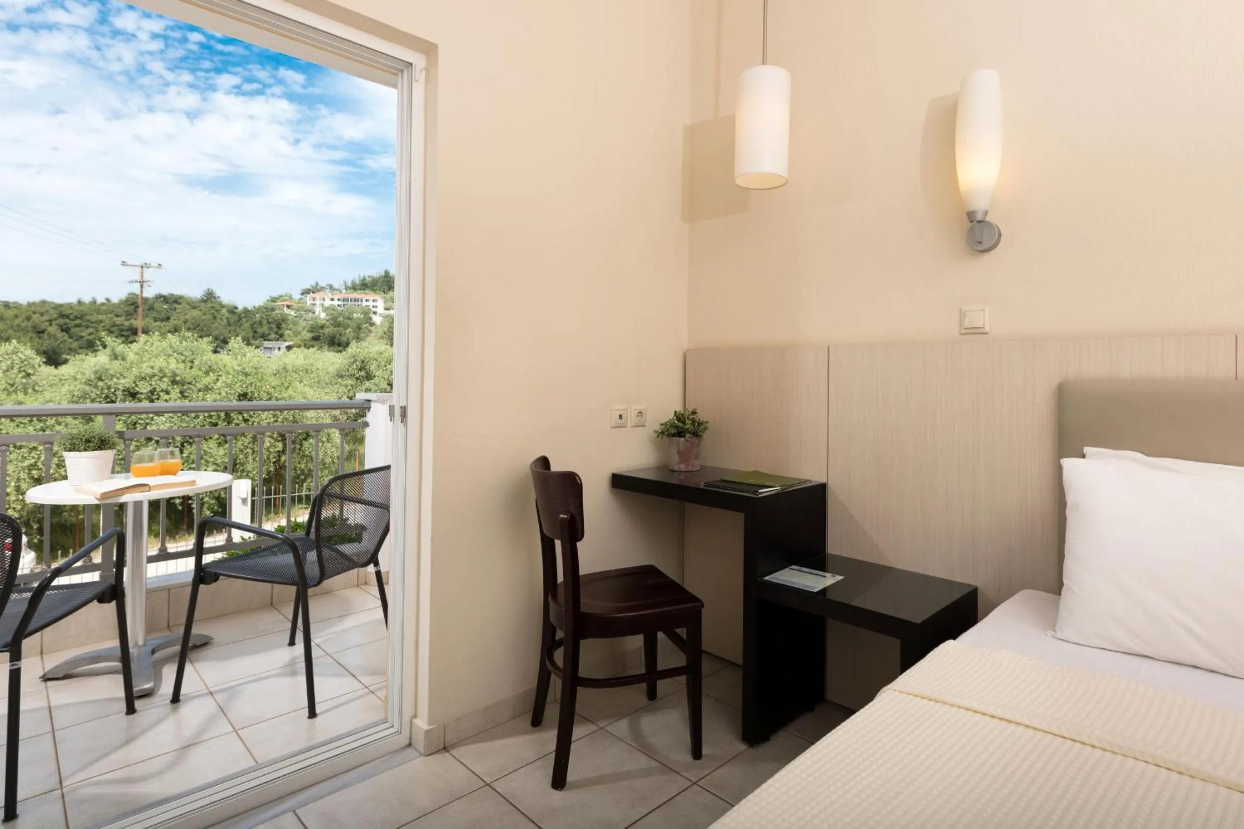 Bed in Louloudis Boutique Hotel