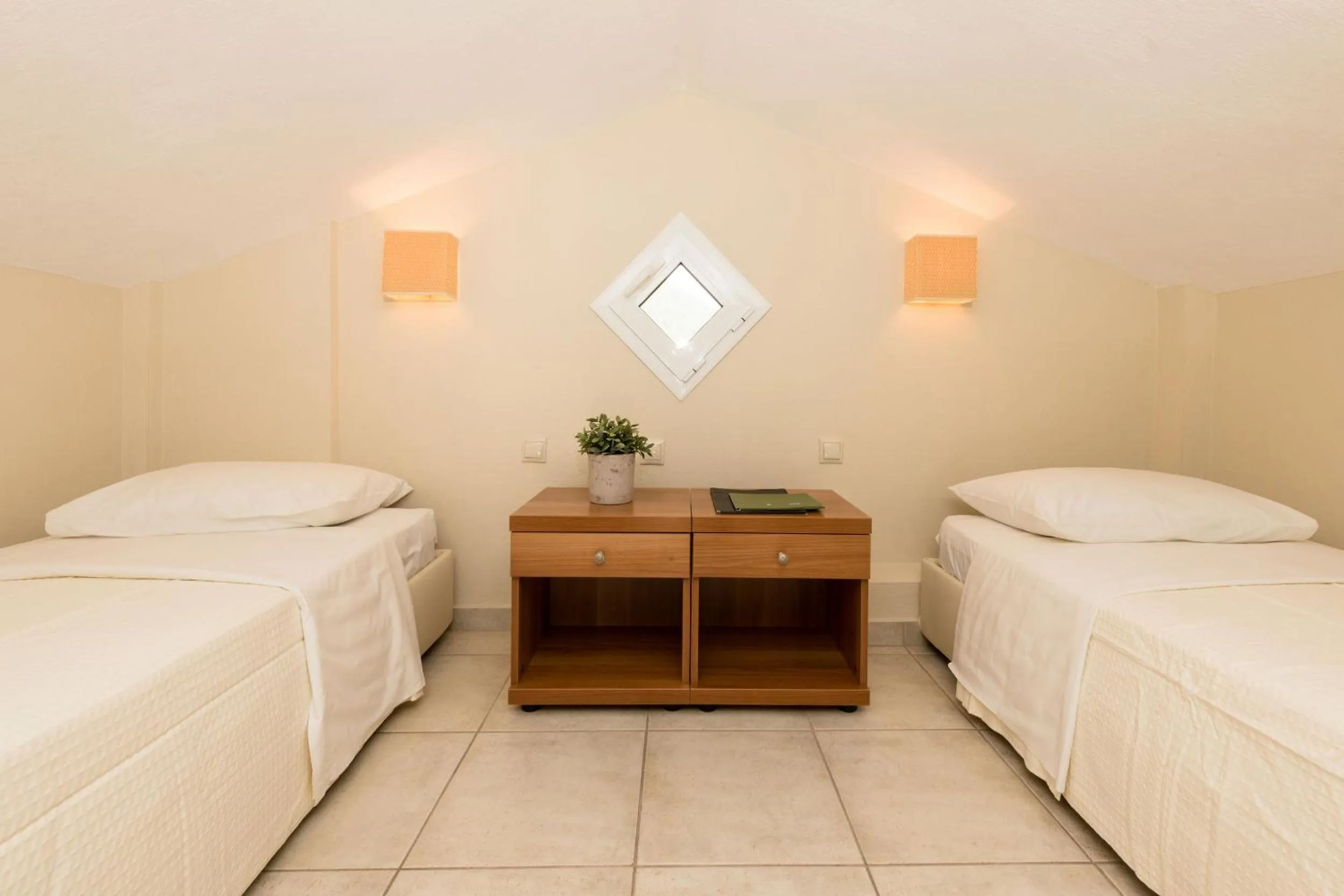 Bed in Louloudis Boutique Hotel