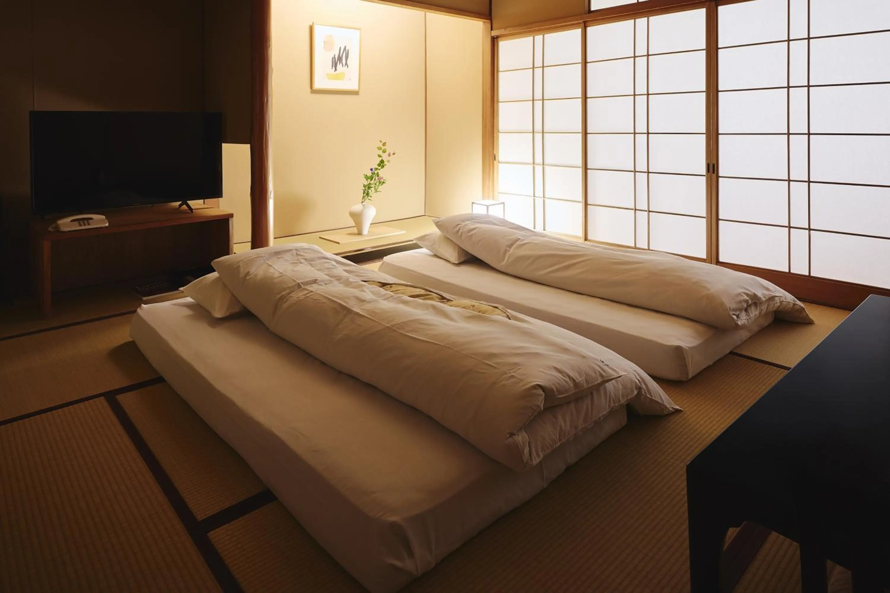Bed in Arima Onsen Takayamaso Hanano