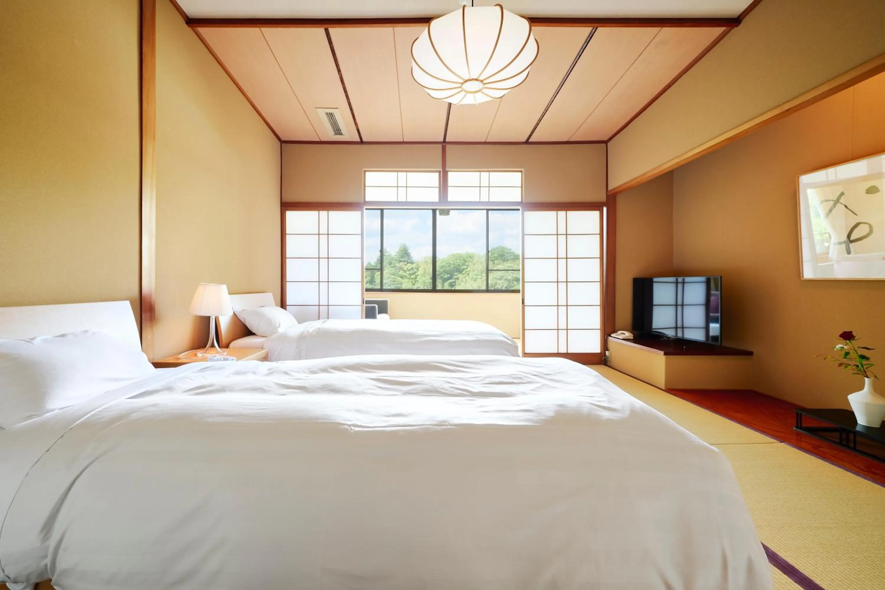 Bed in Arima Onsen Takayamaso Hanano