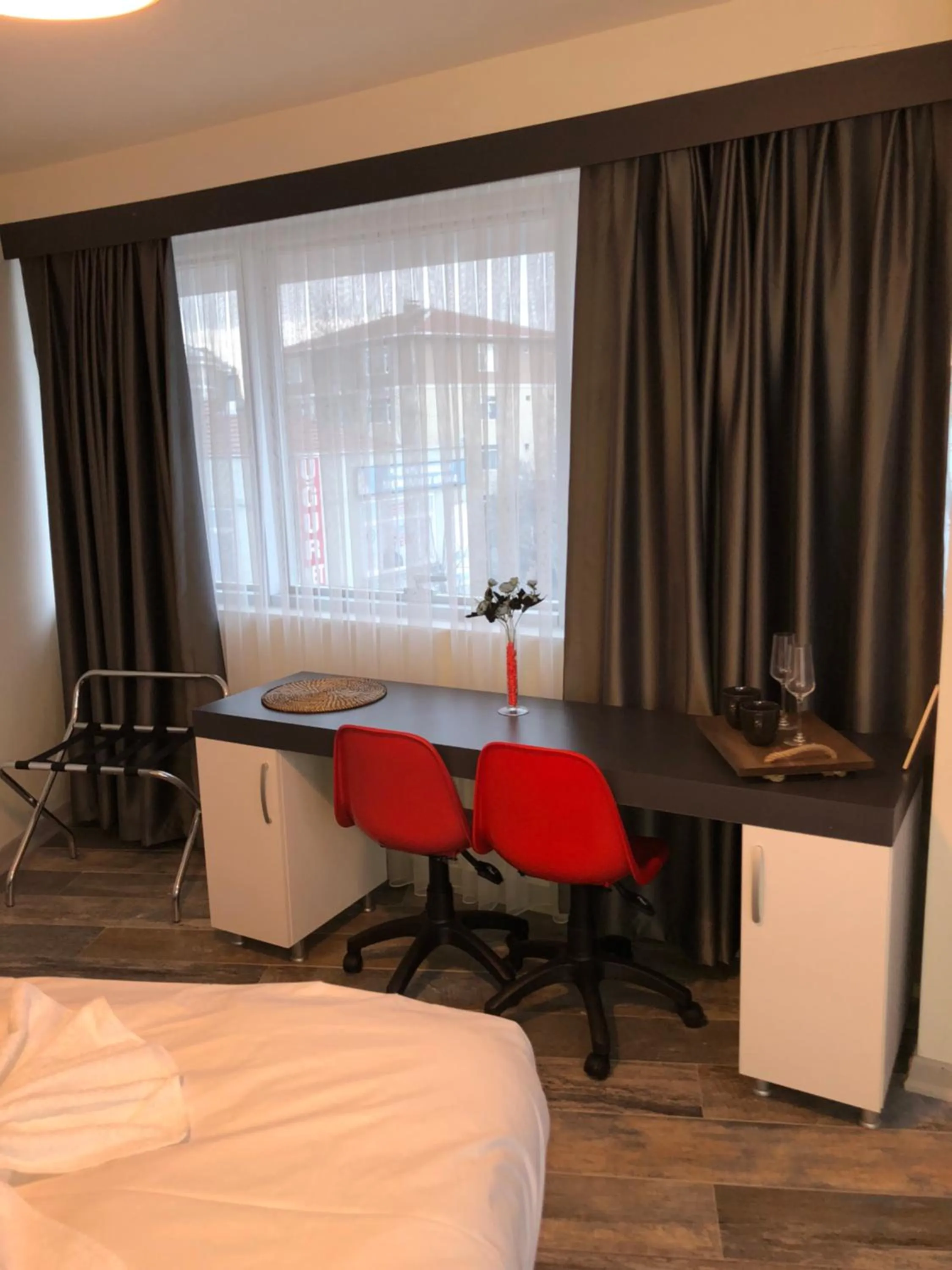 Seating area, TV/Entertainment Center in Eva Otel