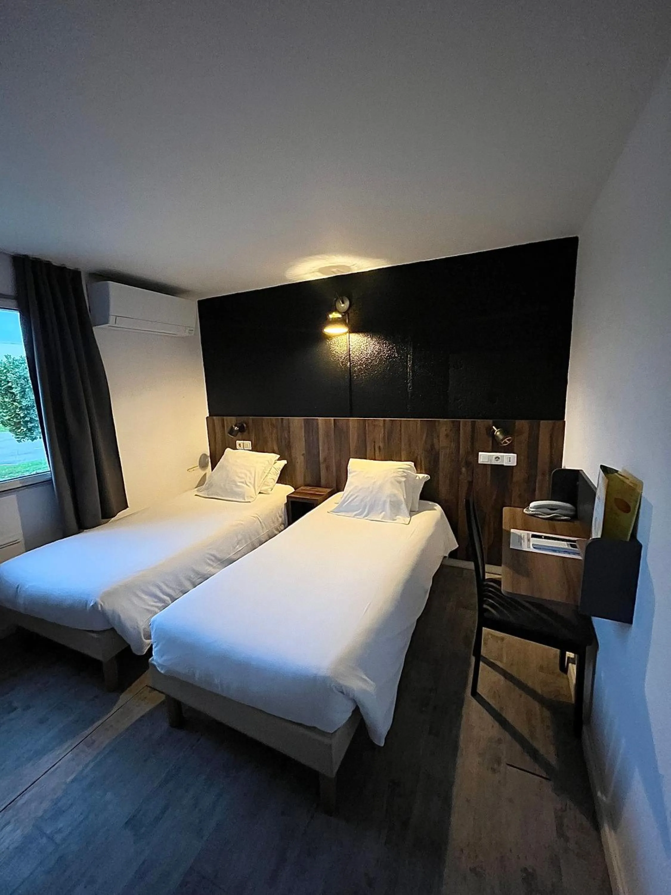 Bed in FastHôtel Mont de Marsan - Un Hôtel FH Collection