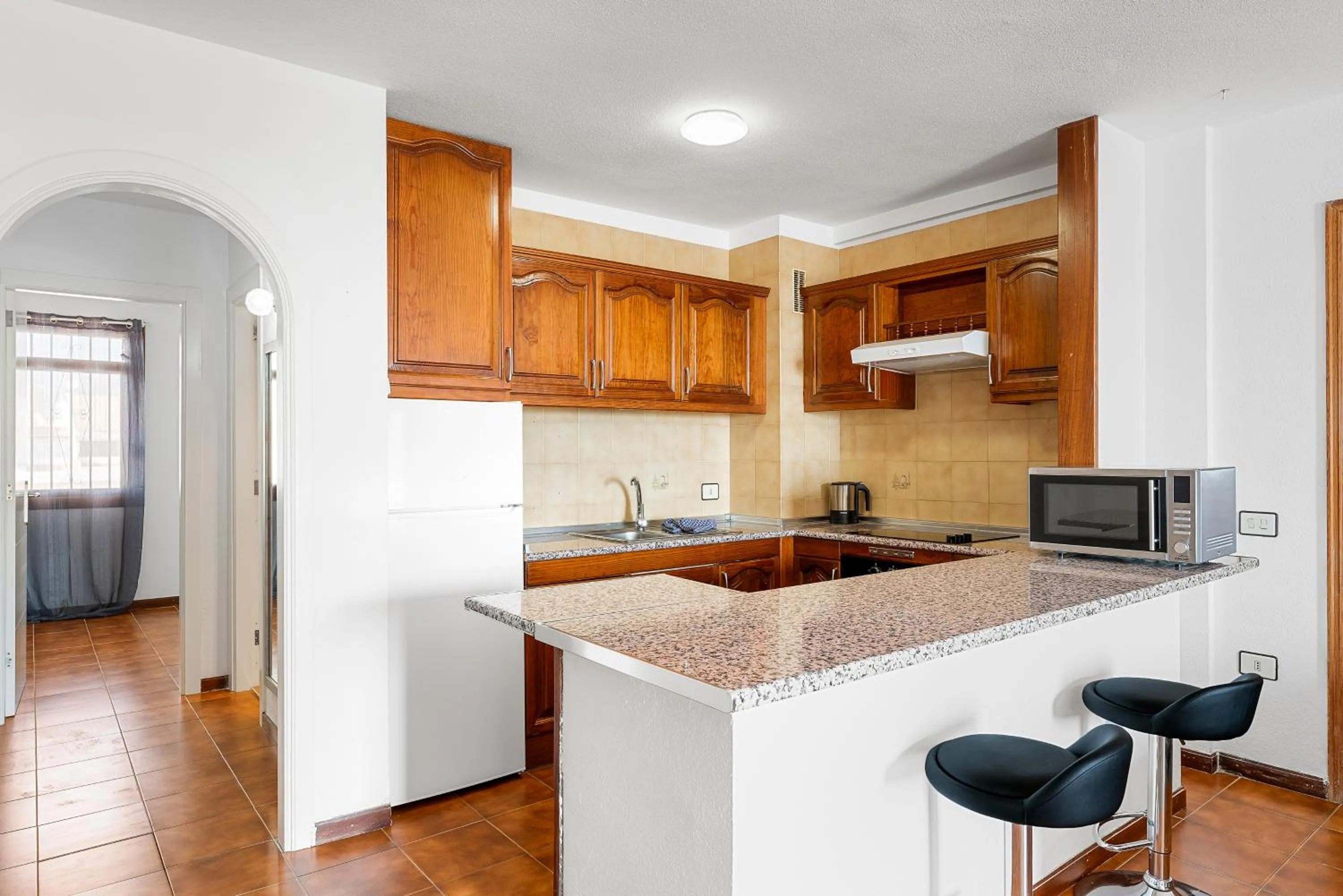 Kitchen or kitchenette in Paloma Beach Apartments